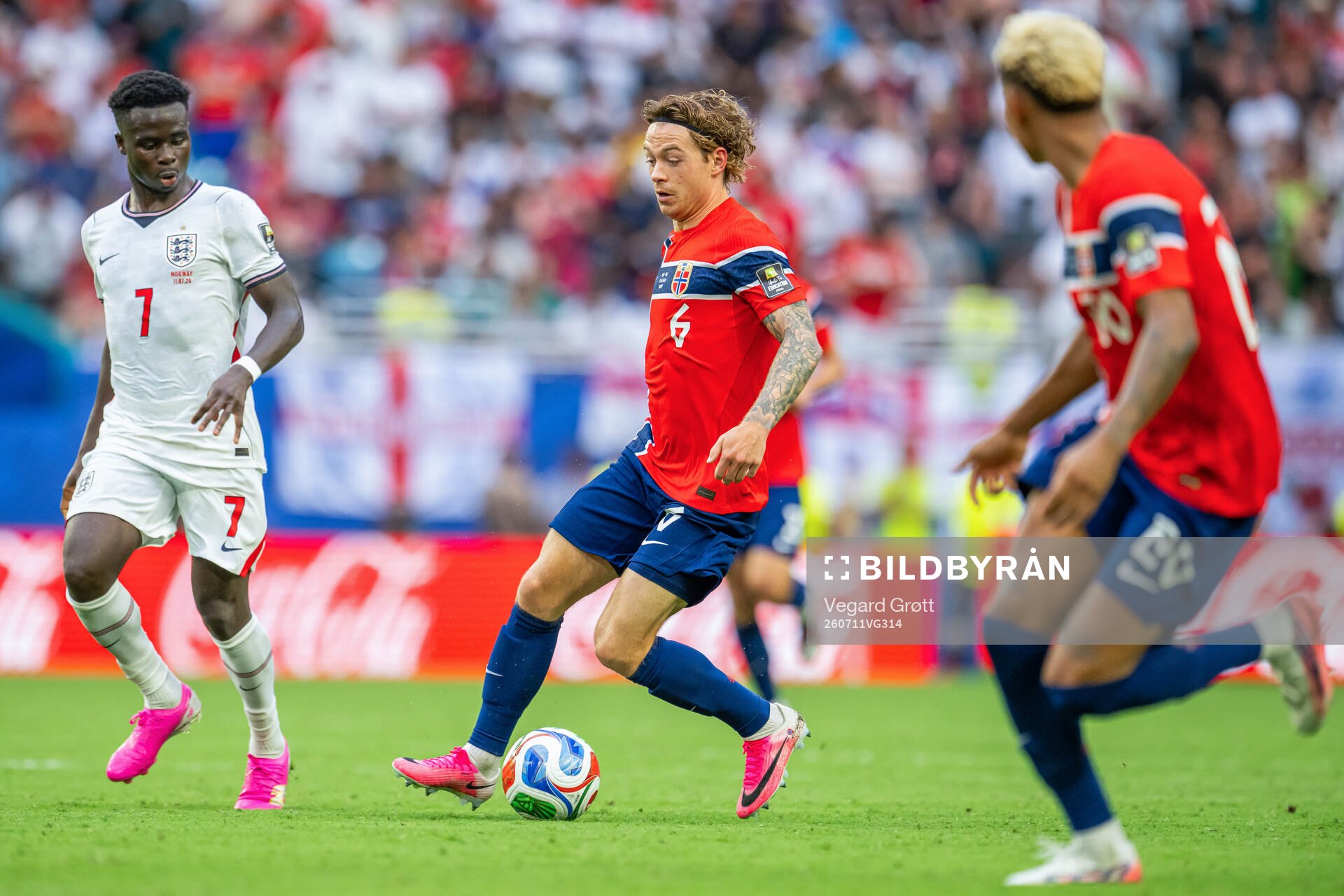 Bukayo Saka of England and Patrick Berg of Norway
