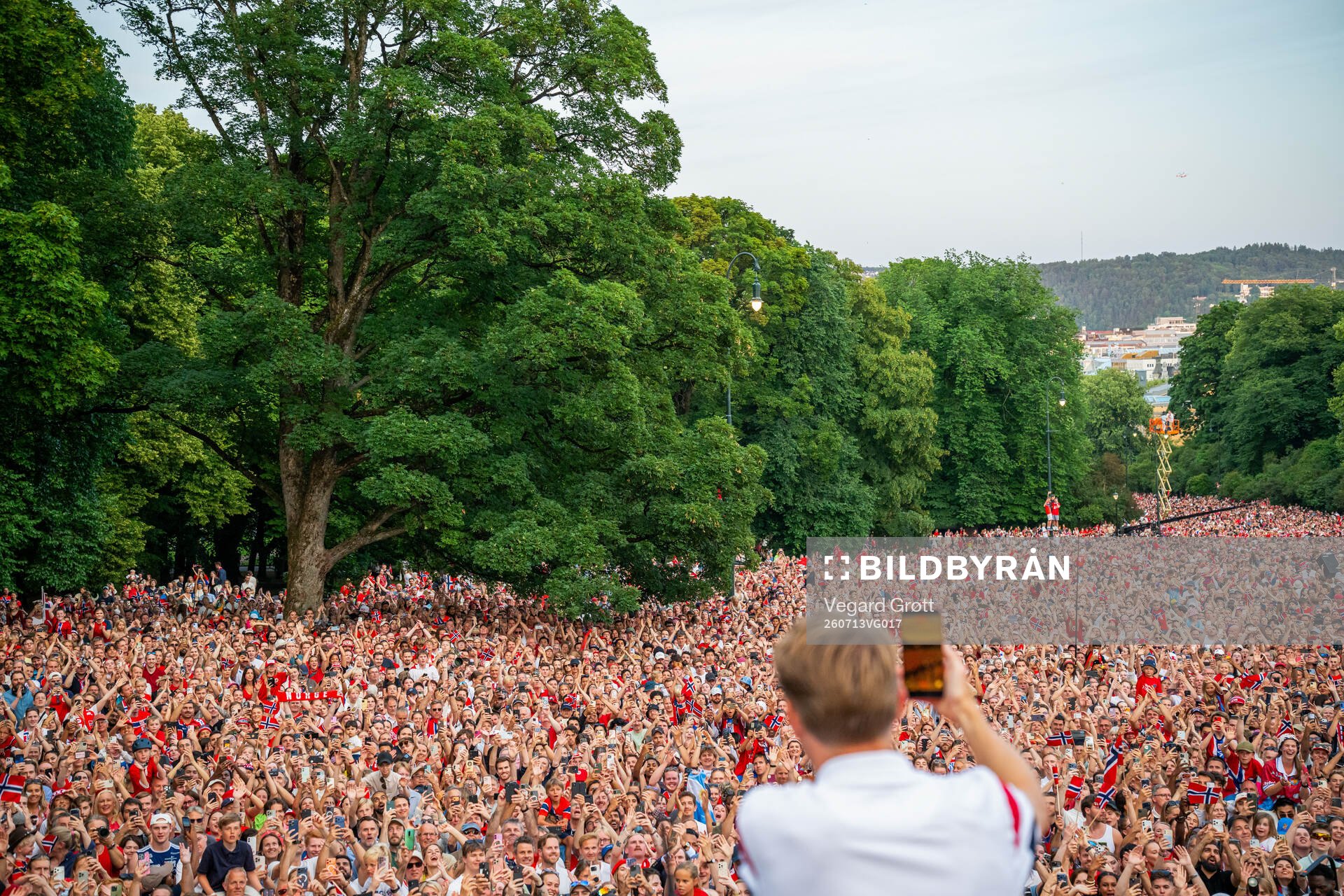 Martin Ødegaard of Norway takes a video of the spectators