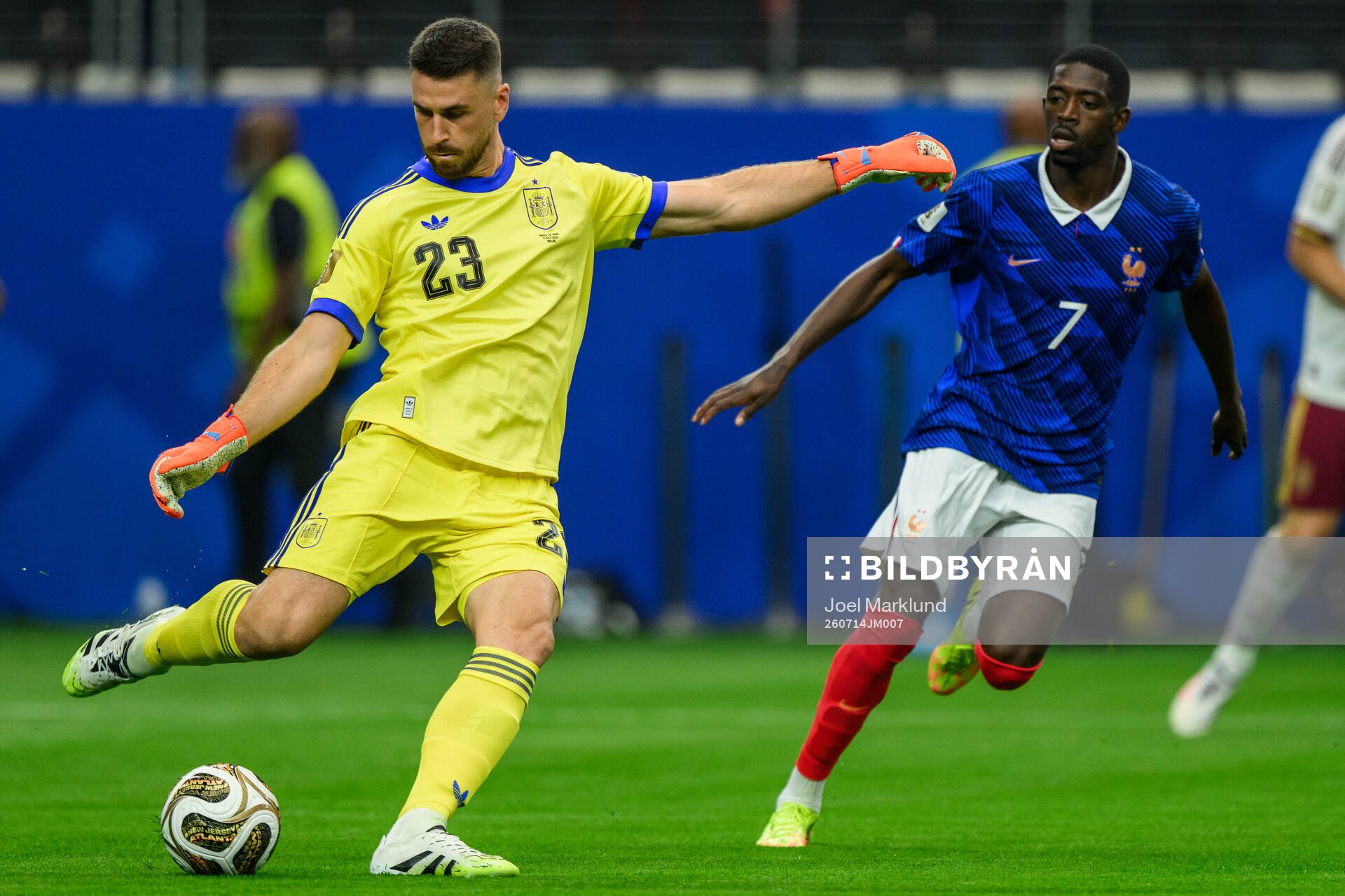goalkeeper Unai Simon of Spain and Ousmane Dembele of France