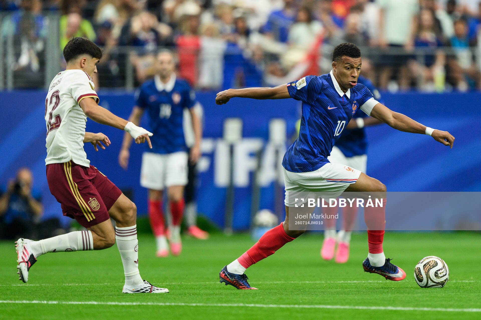 Pau Cubarsi of Spain and Kylian Mbappe of France