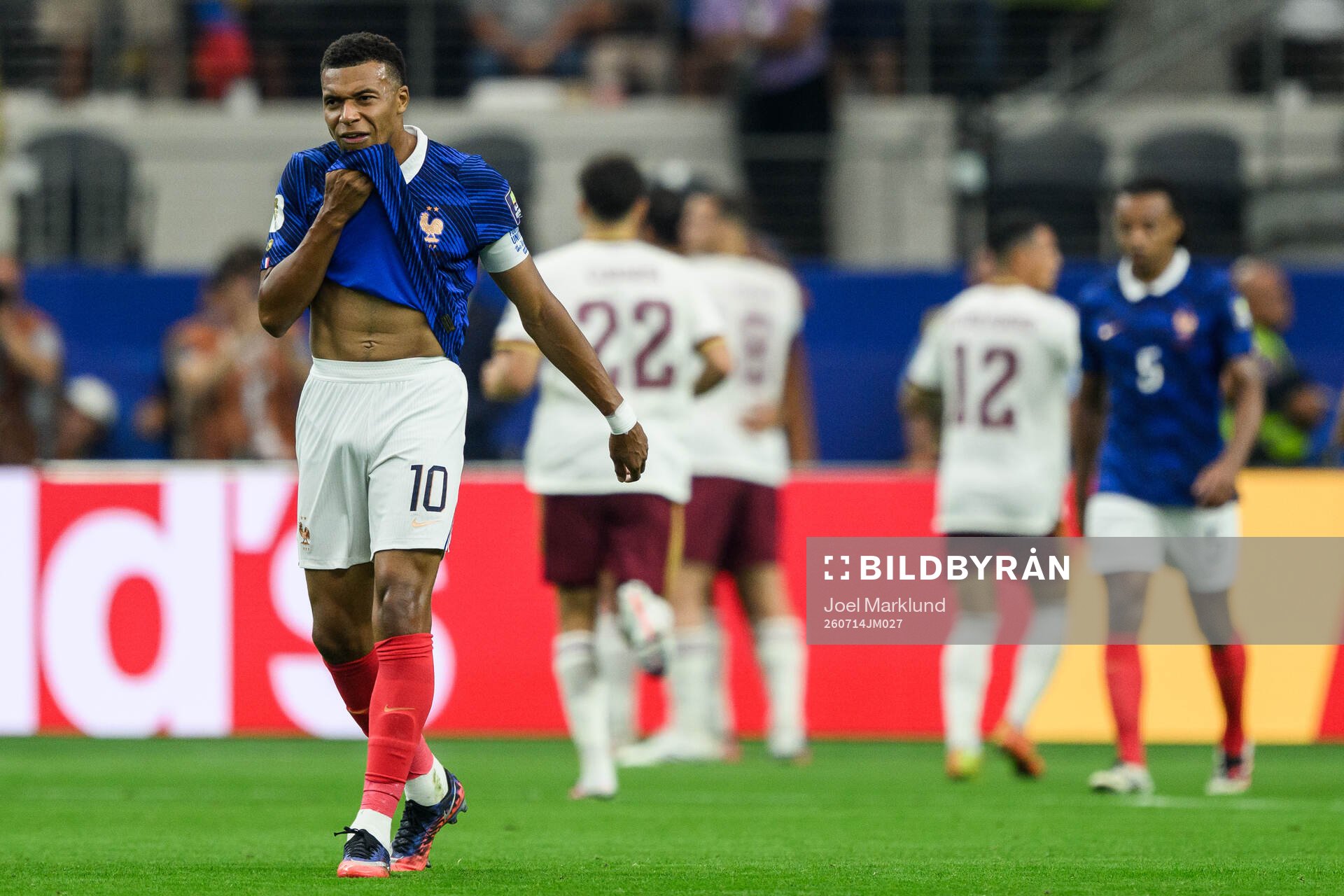 Kylian Mbappe of France looks dejected