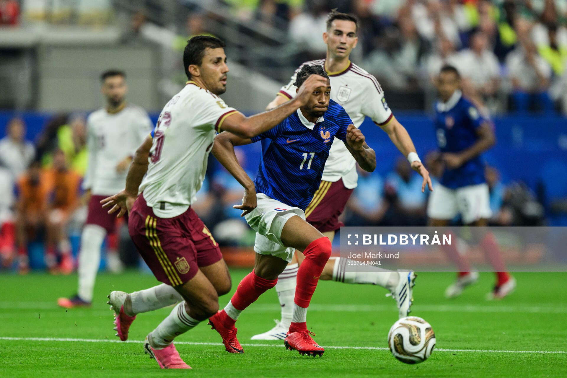Rodri of Spain and Michael Olise of France