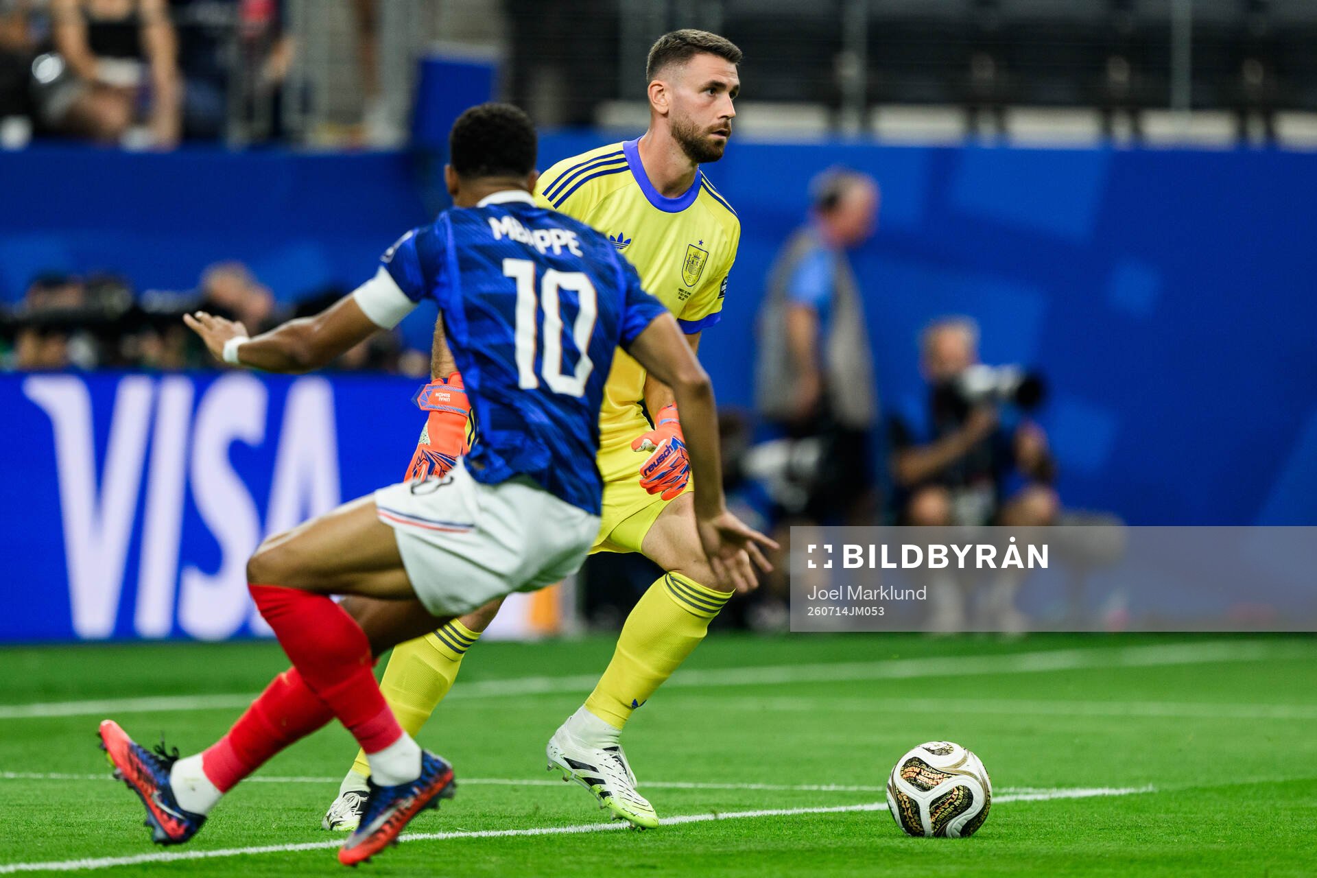Kylian Mbappe of France and goalkeeper Unai Simon of Spain