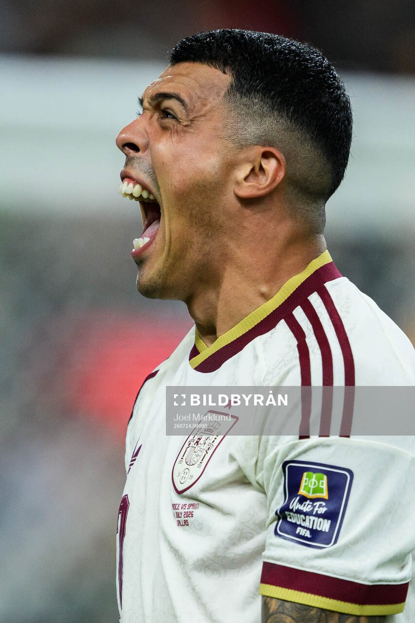 Pedro Porro of Spain celebrates