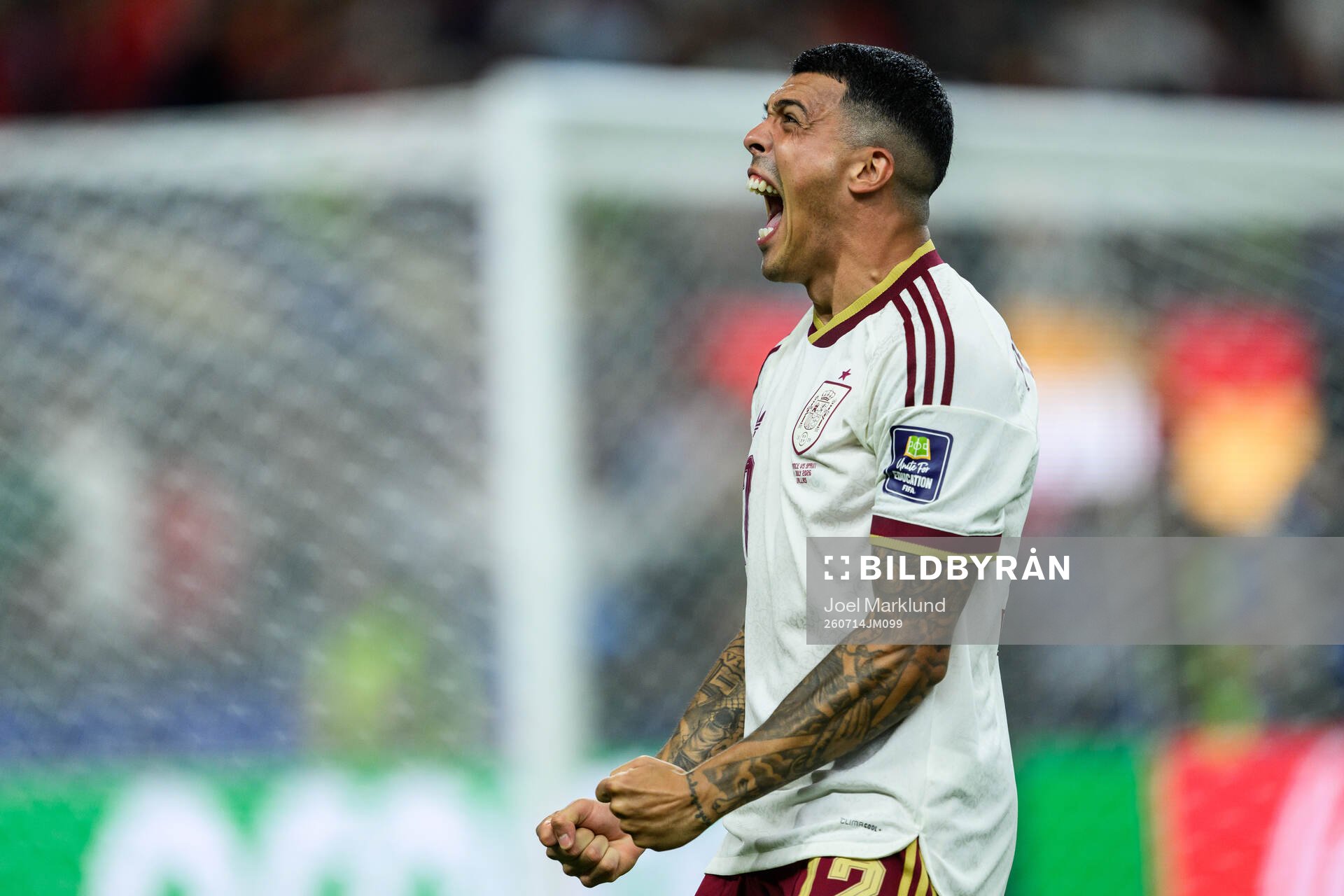 Pedro Porro of Spain celebrates