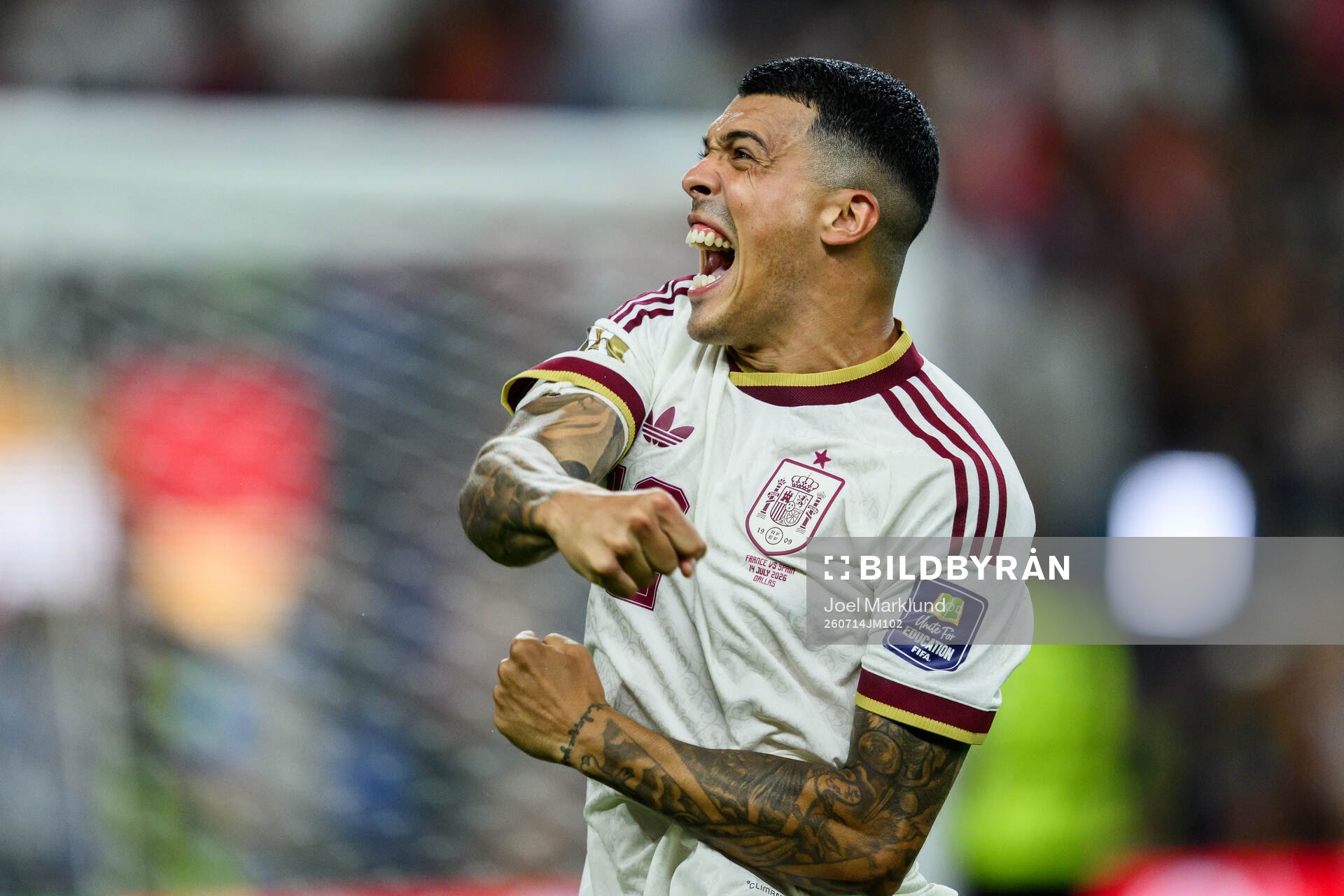 Pedro Porro of Spain celebrates