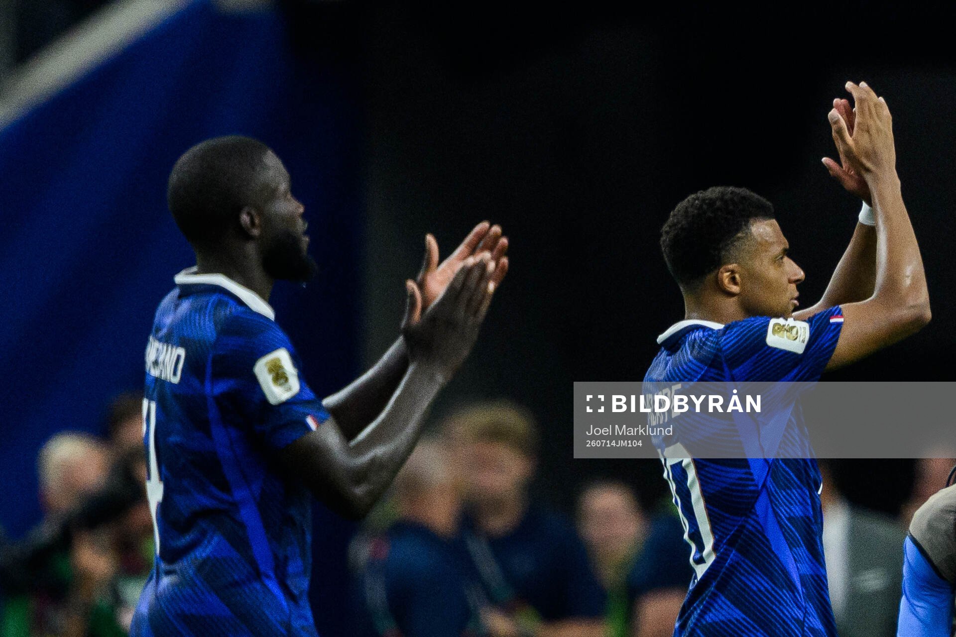 Dayot Upamecano and Kylian Mbappe of France
