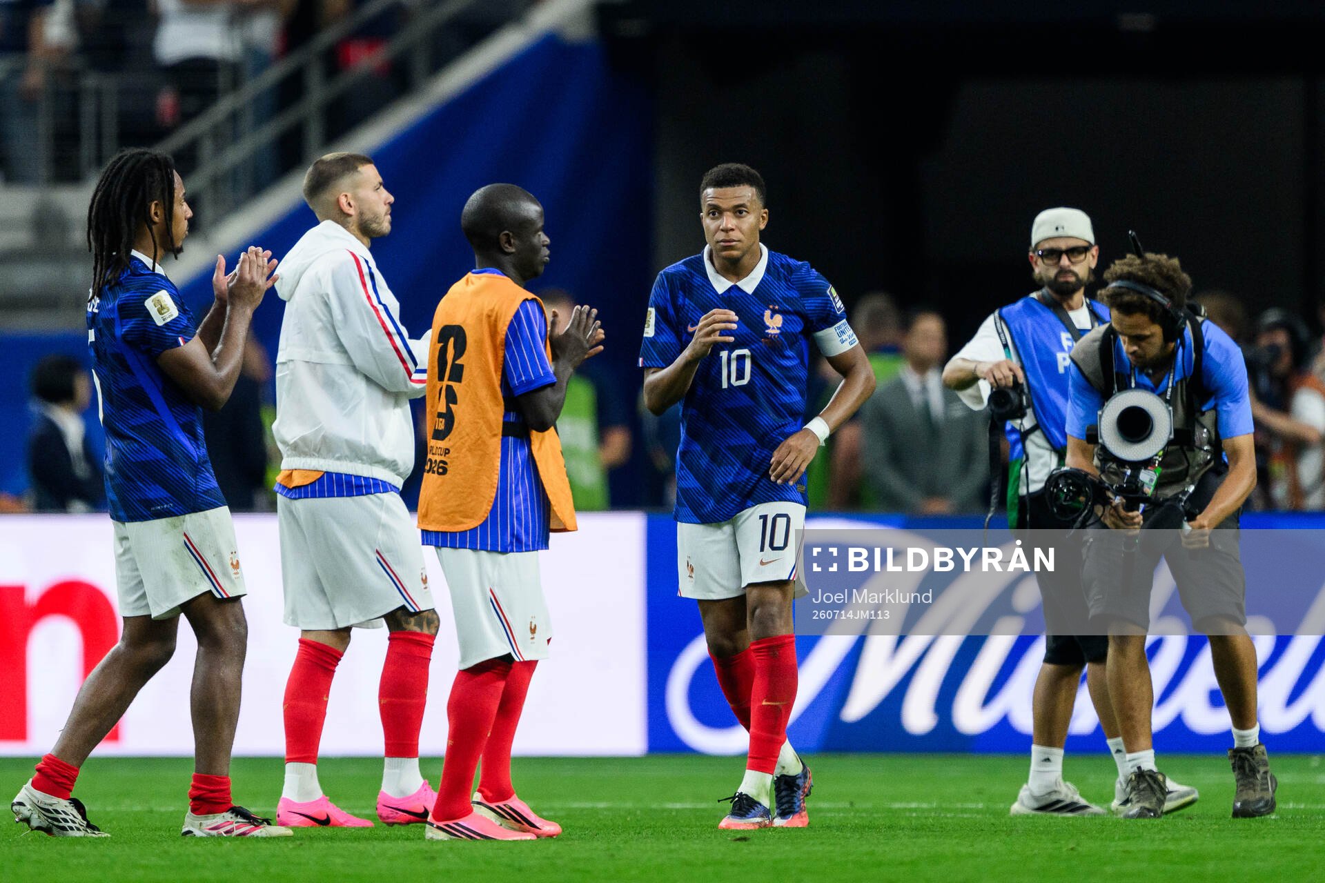 Kylian Mbappe of France looks dejected