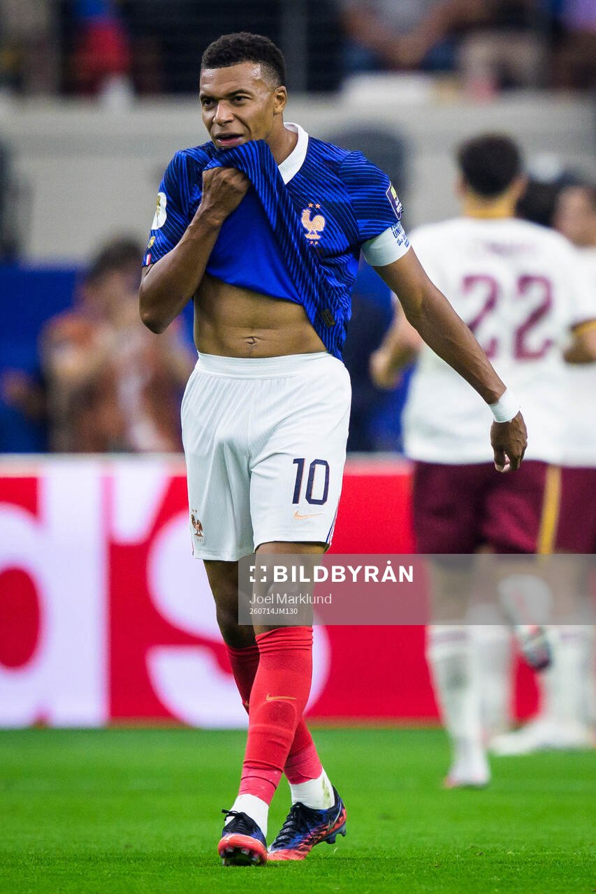 Kylian Mbappe of France looks dejected