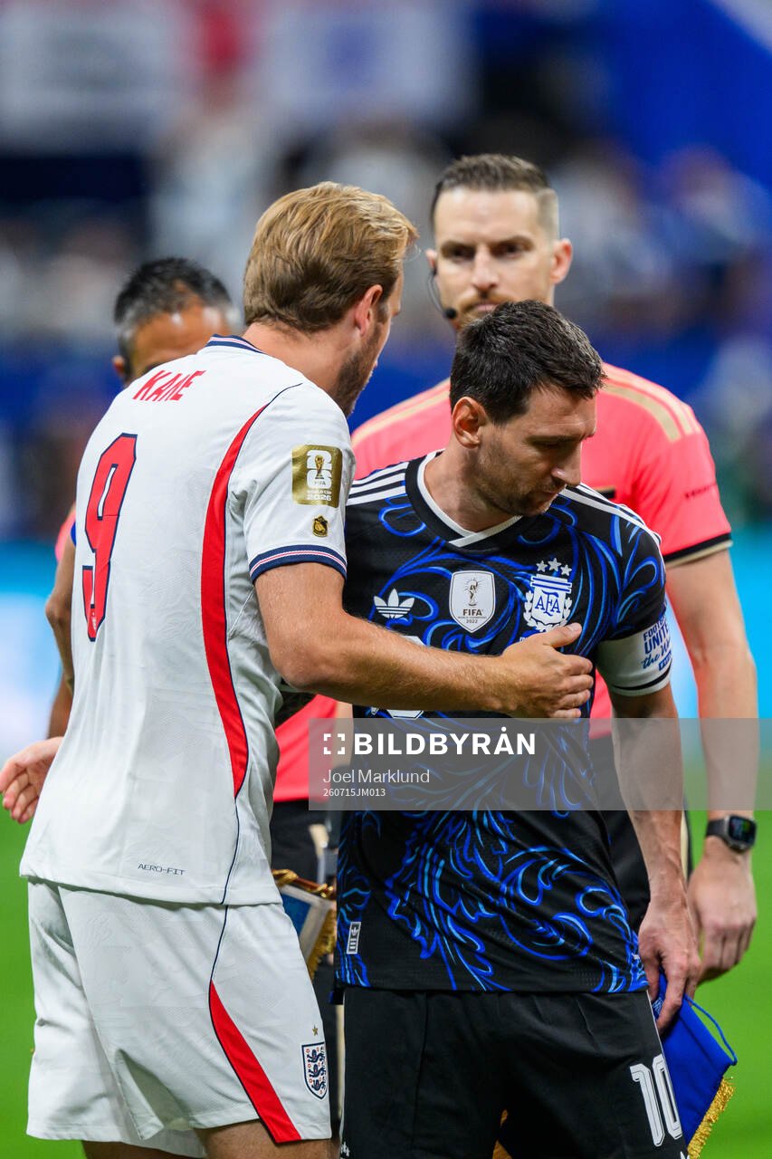 Harry Kane of England and Lionel Messi of Argentina