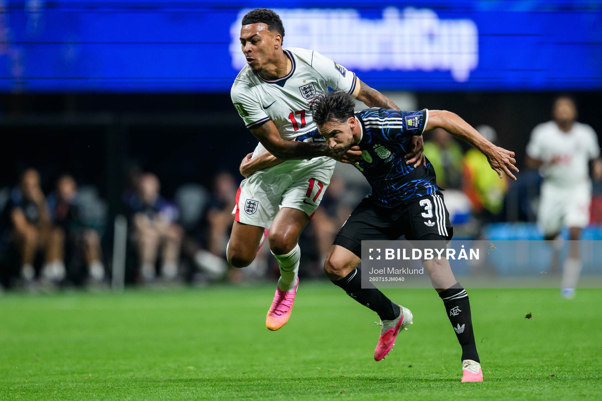 Morgan Rogers of England and Nicolas Tagliafico of Argentina