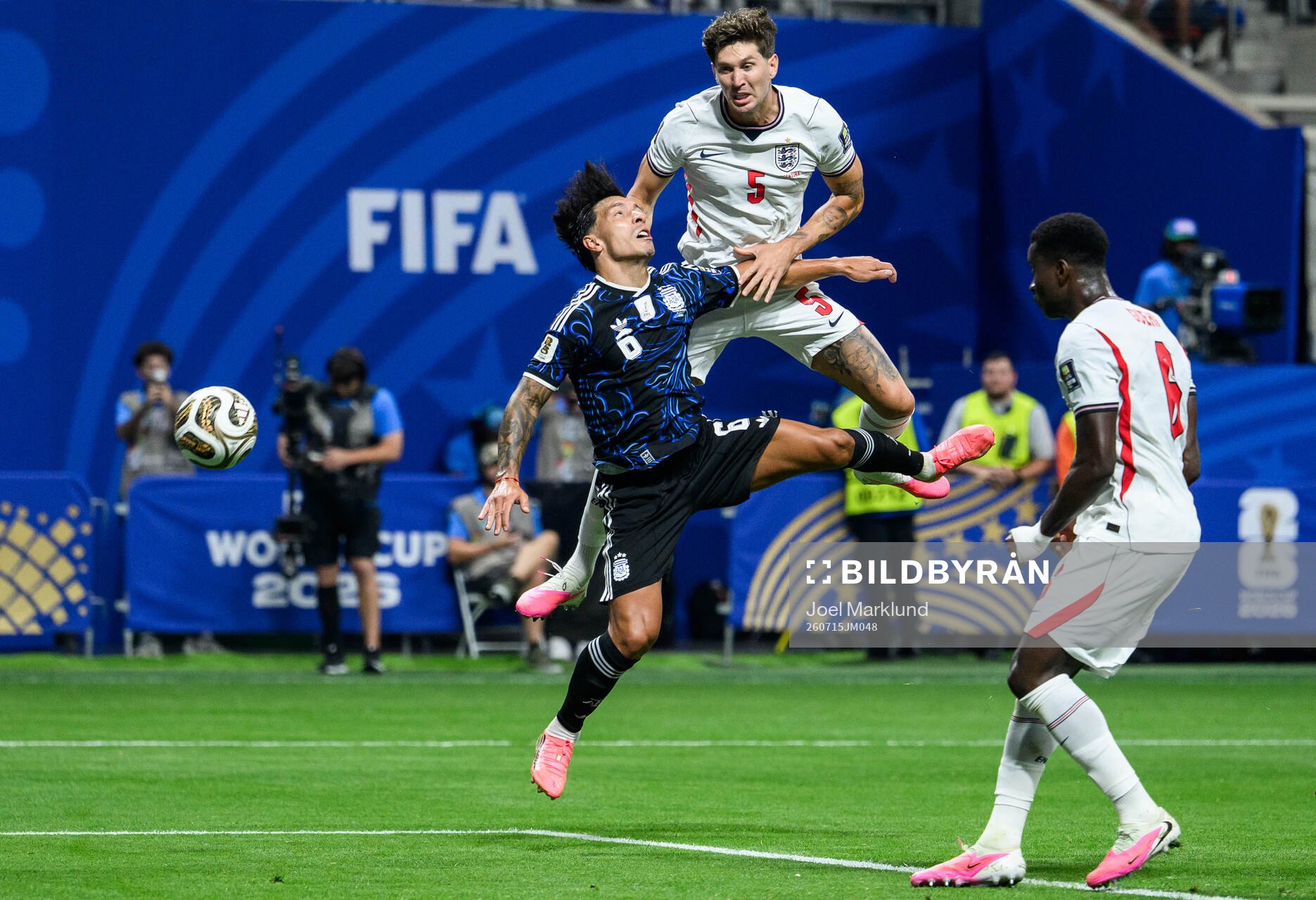 Lisandro Martinez of Argentina and John Stones of England
