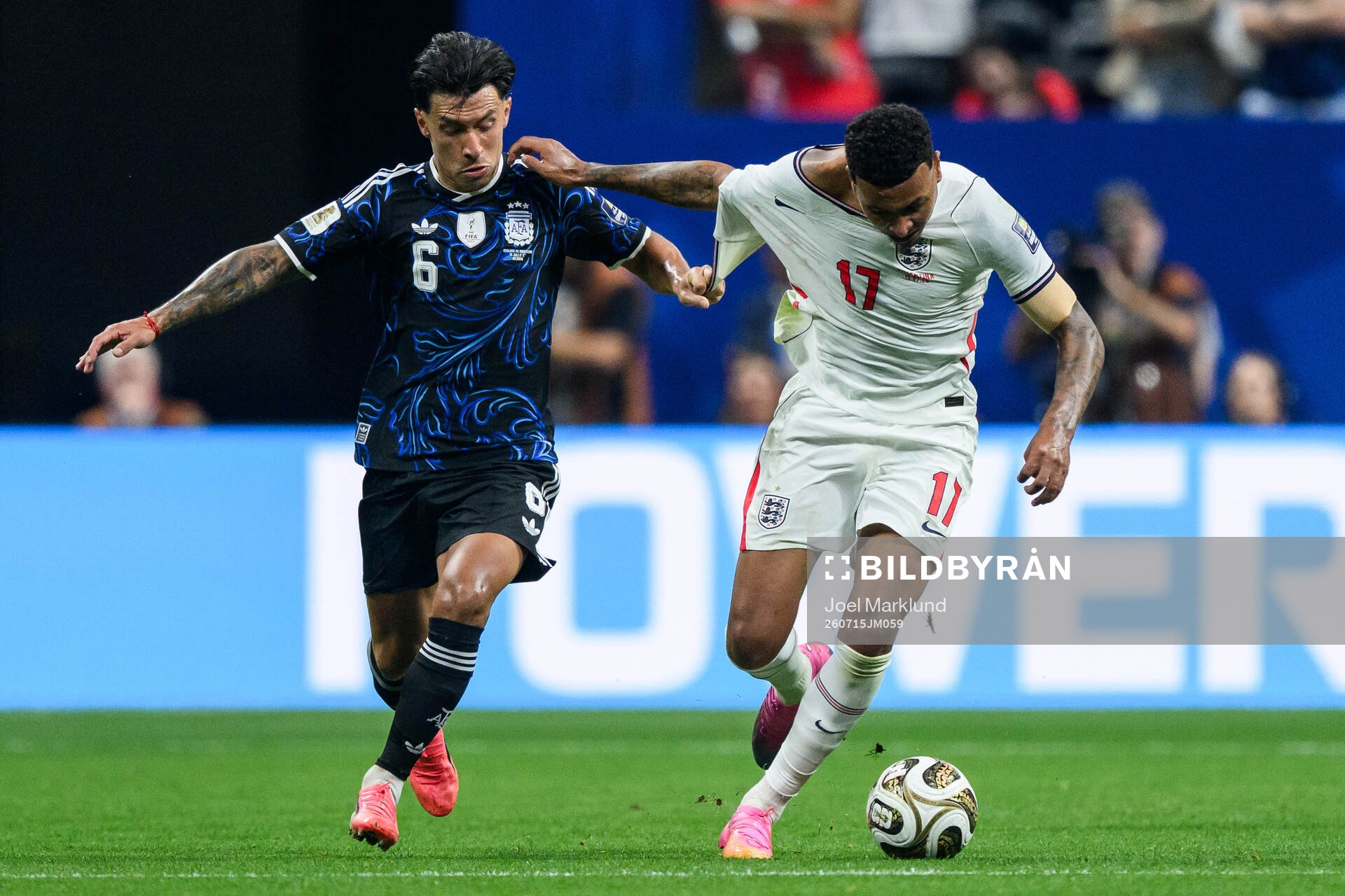 Lisandro Martinez of Argentina and Morgan Rogers of England