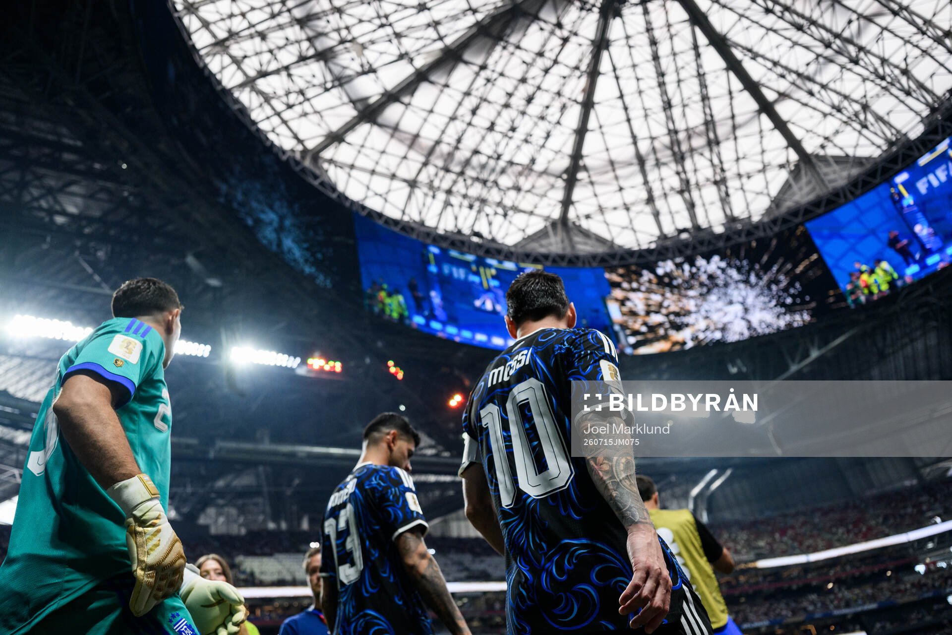 goalkeeper Emiliano Martinez, Cristian Romero and Lionel