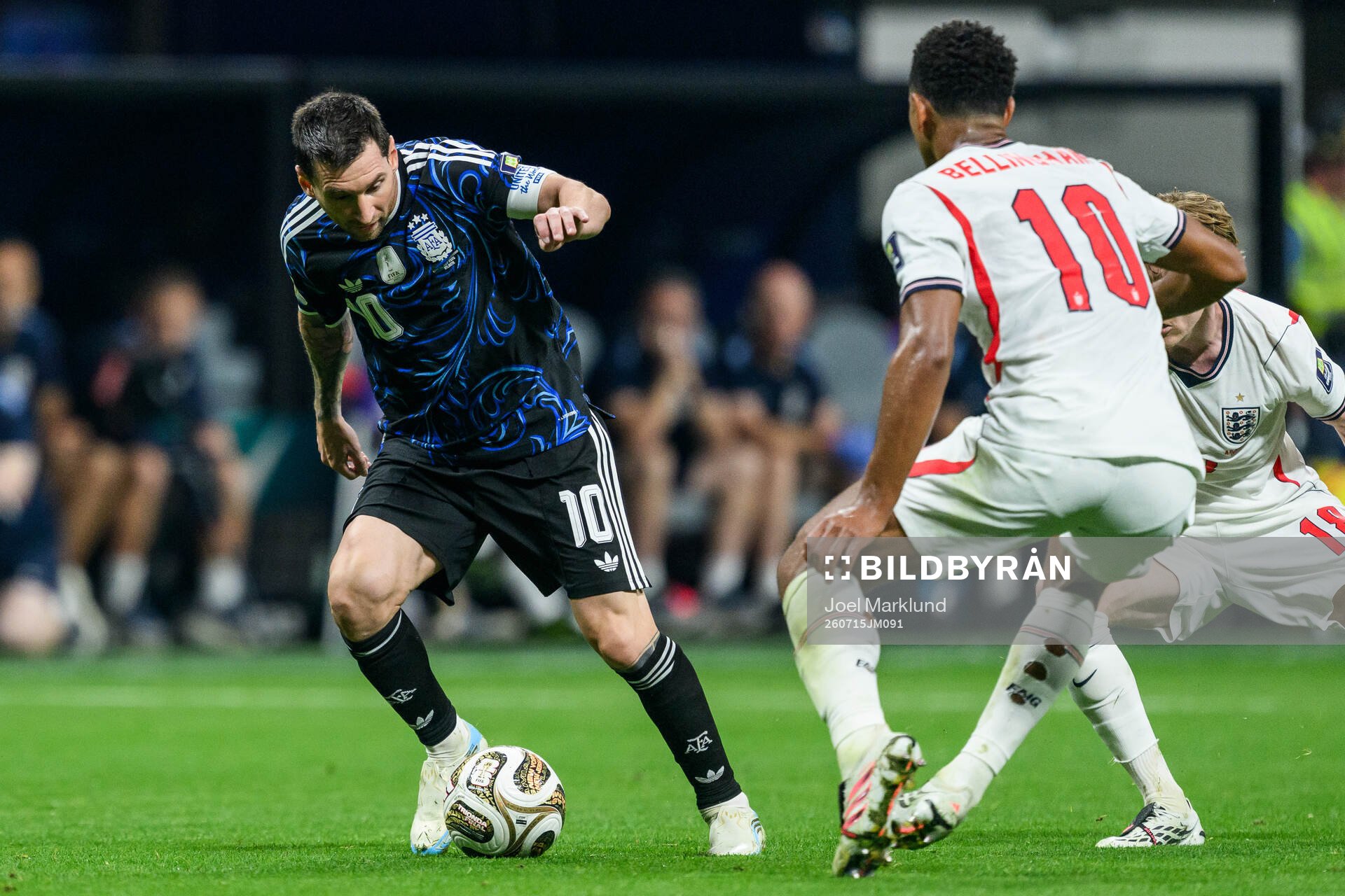Lionel Messi of Argentina and Jude Bellingham of England