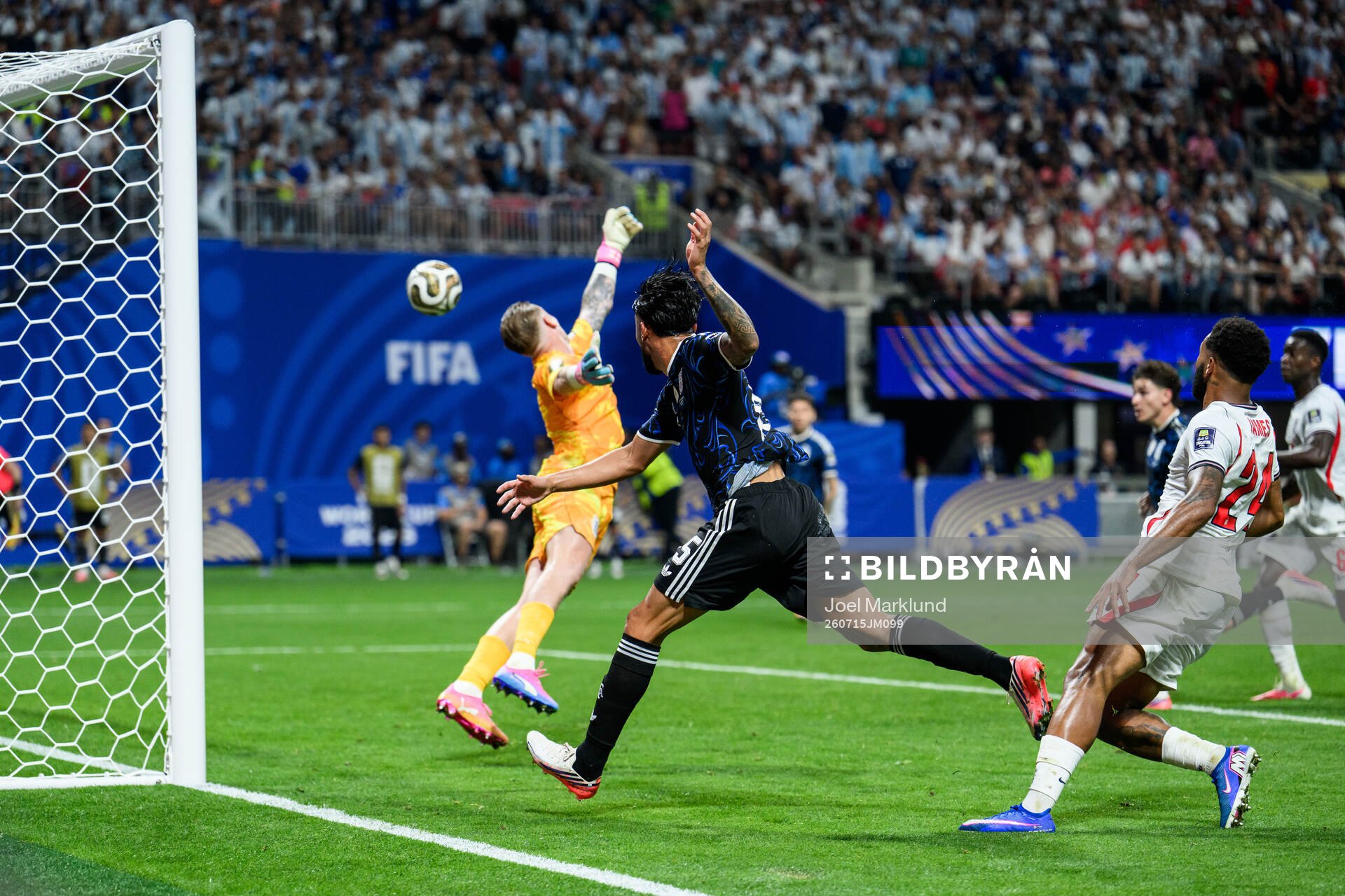 Nico Gonzalez of Argentina and goalkeeper Jordan Pickford