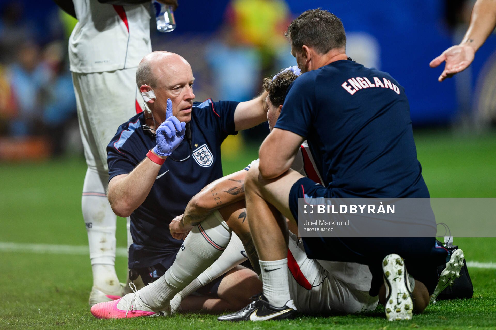 John Stones of England recieves medical attention