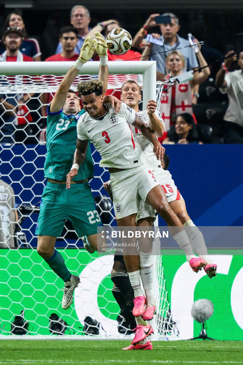 Nico O'Reilly and Dan Burn of England against goalkeeper