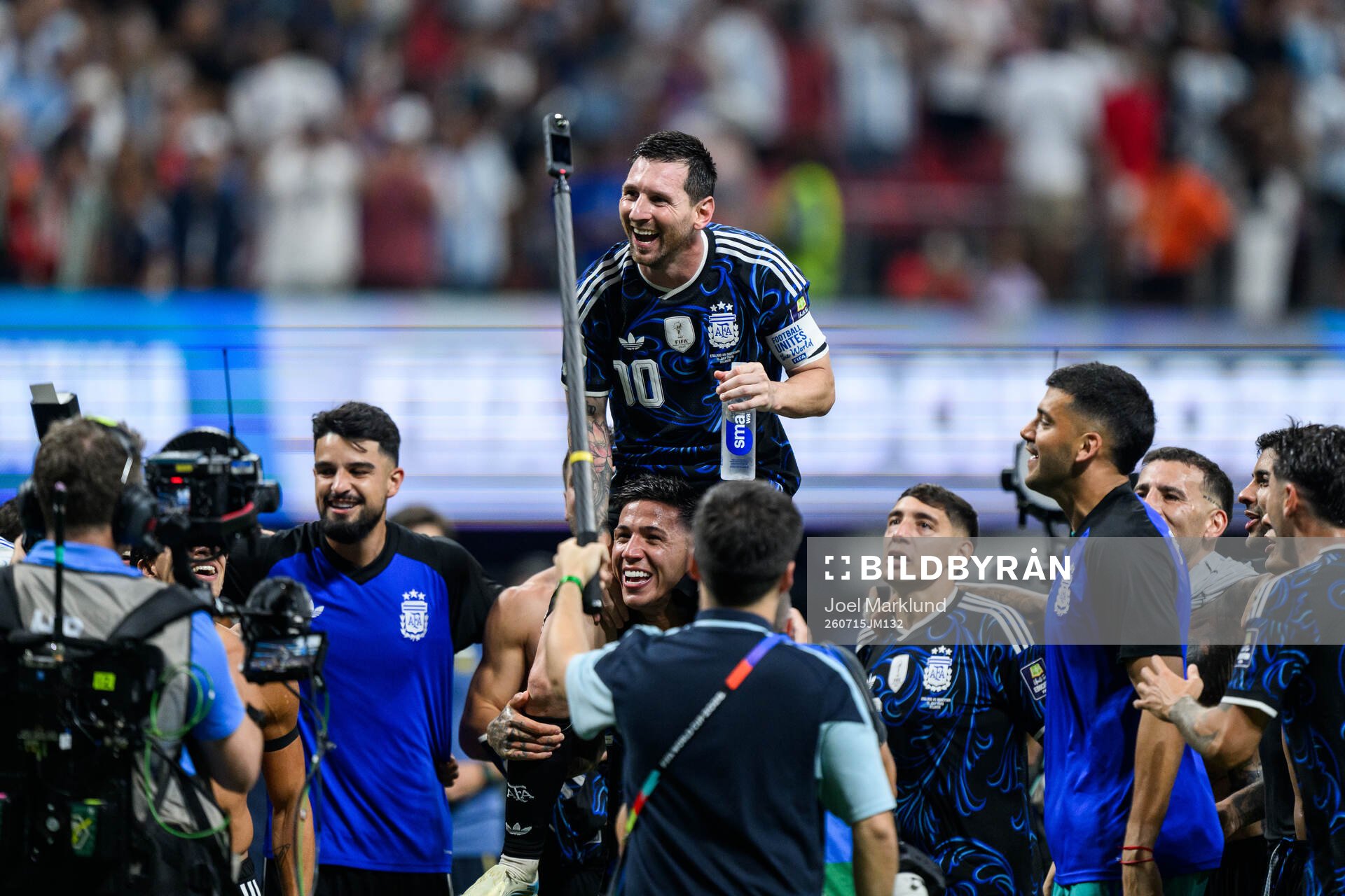Lionel Messi of Argentina celebrate with teammates