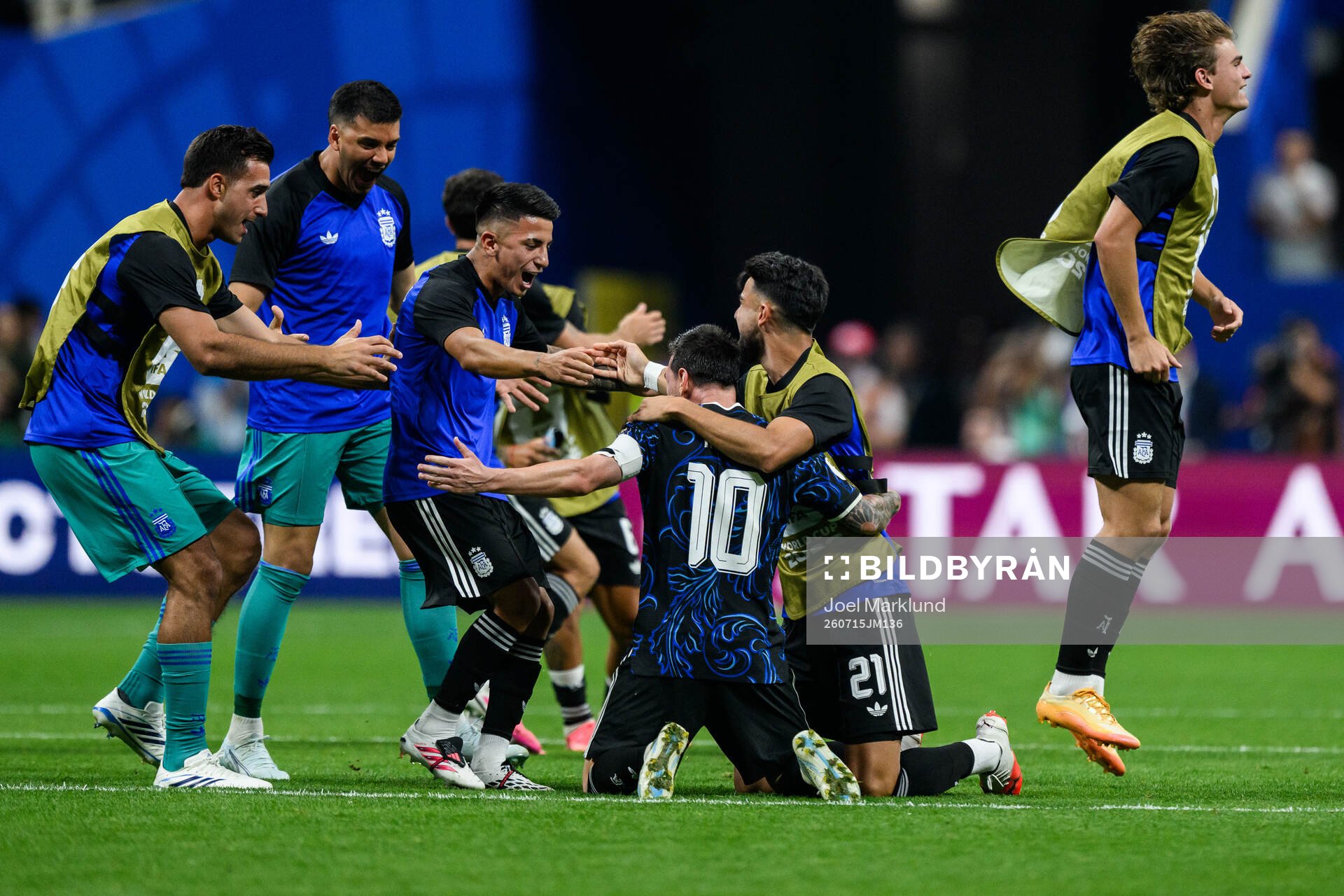 Lionel Messi of Argentina celebrate with teammates
