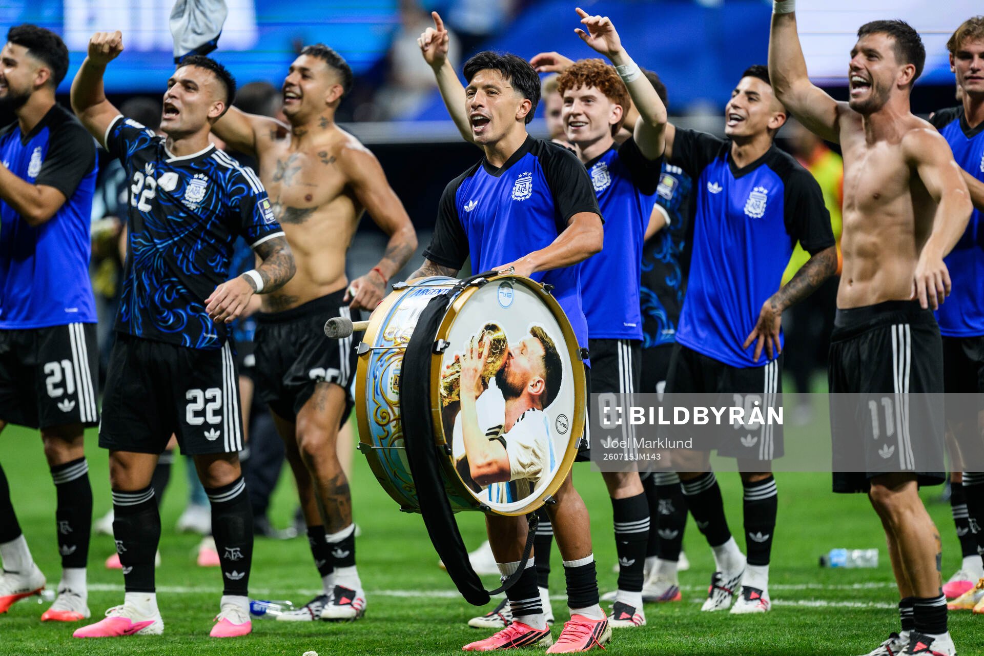 Lisandro Martinez of Argentina celebrates with a drum