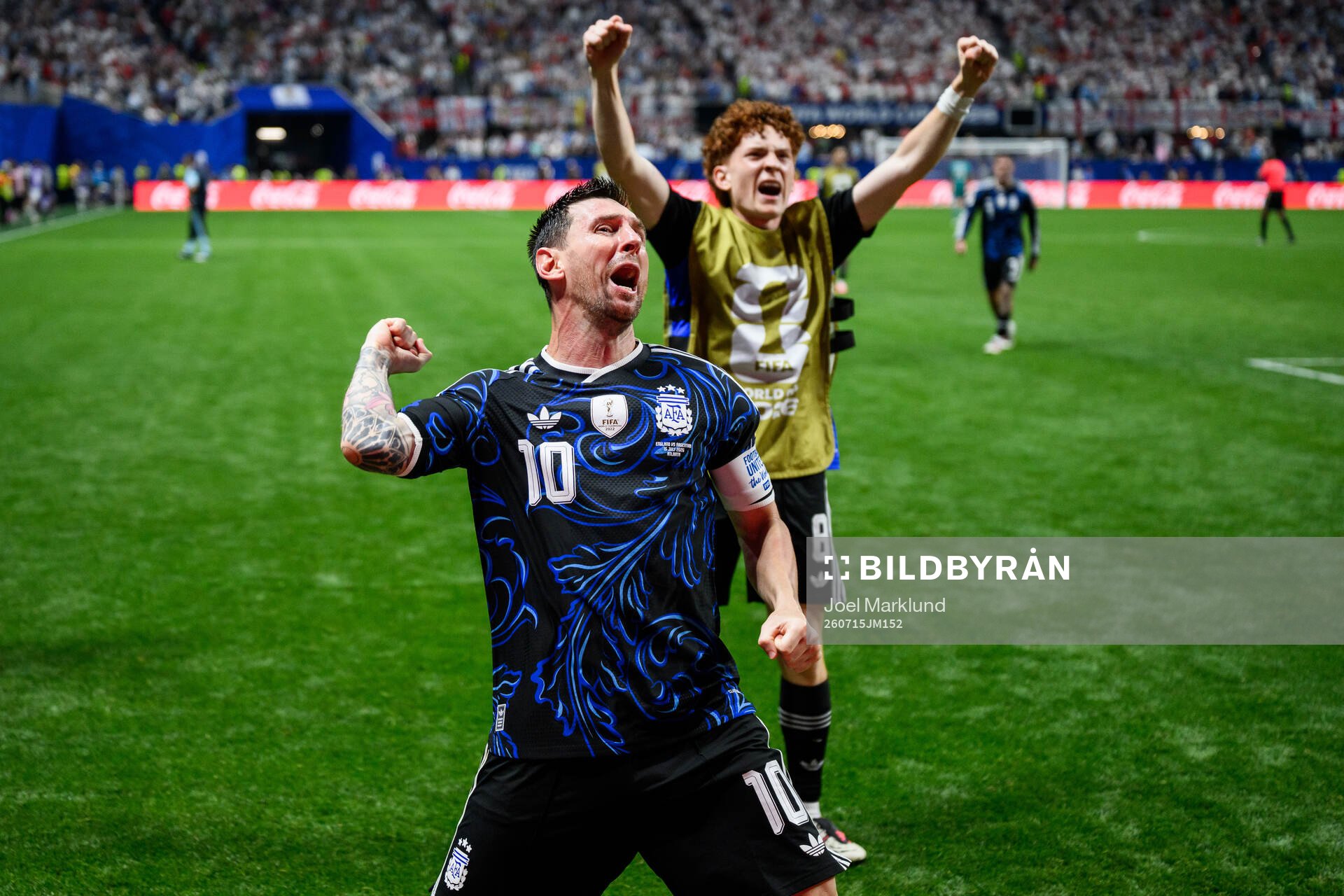 Lionel Messi and Valentin Barco of Argentina celebrate