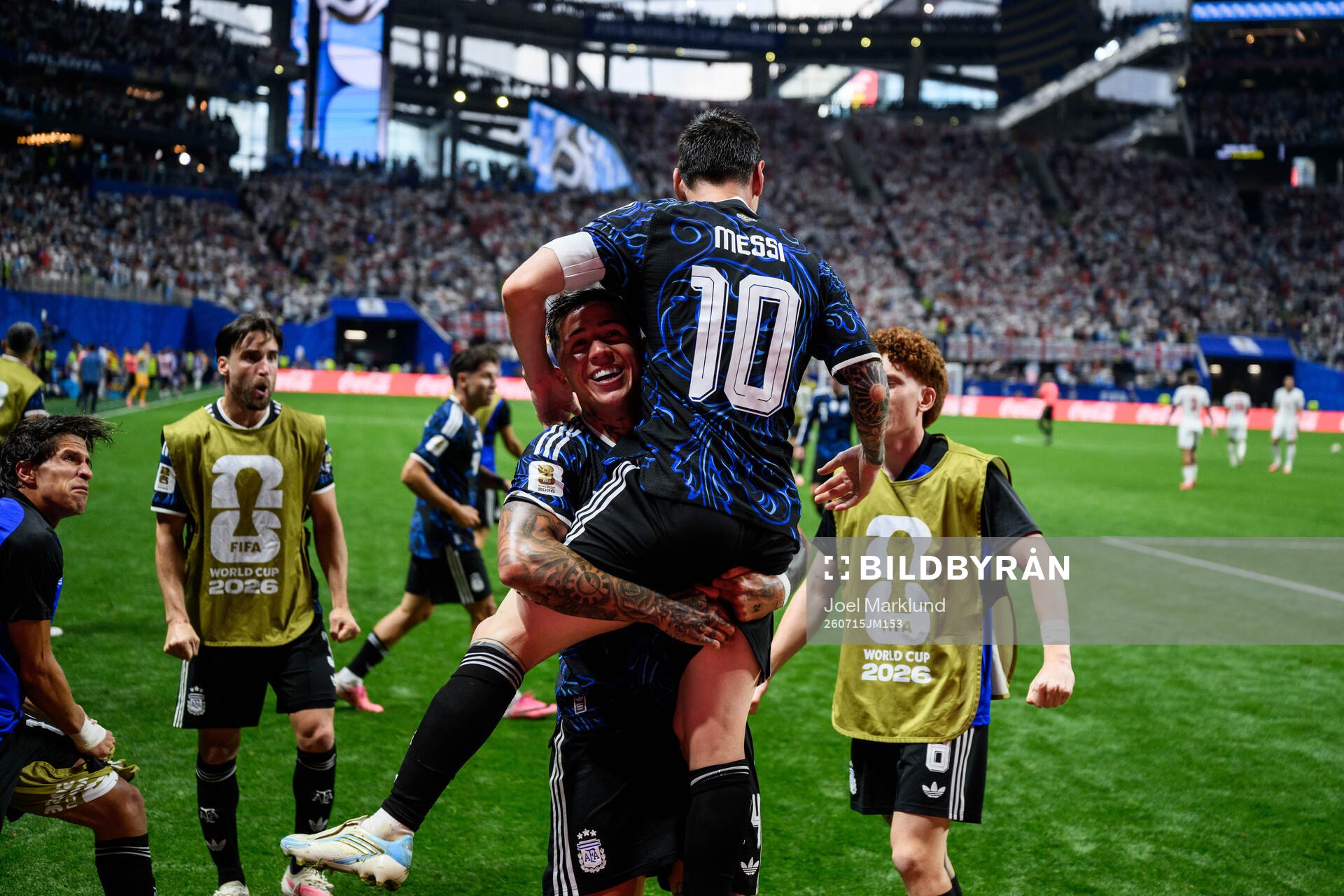 Enzo Fernandez and Lionel Messi of Argentina celebrate