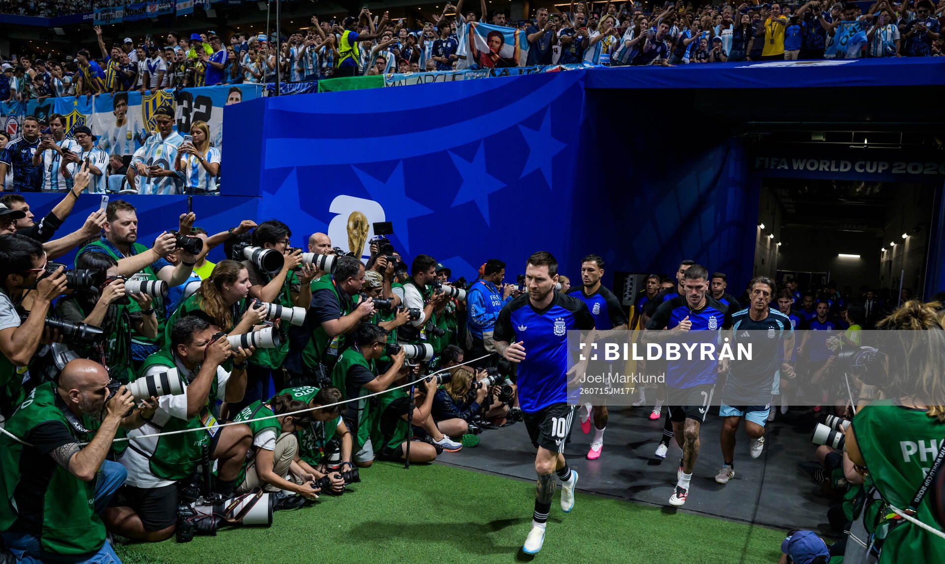 Lionel Messi of Argentina enters the pitch for warm-up