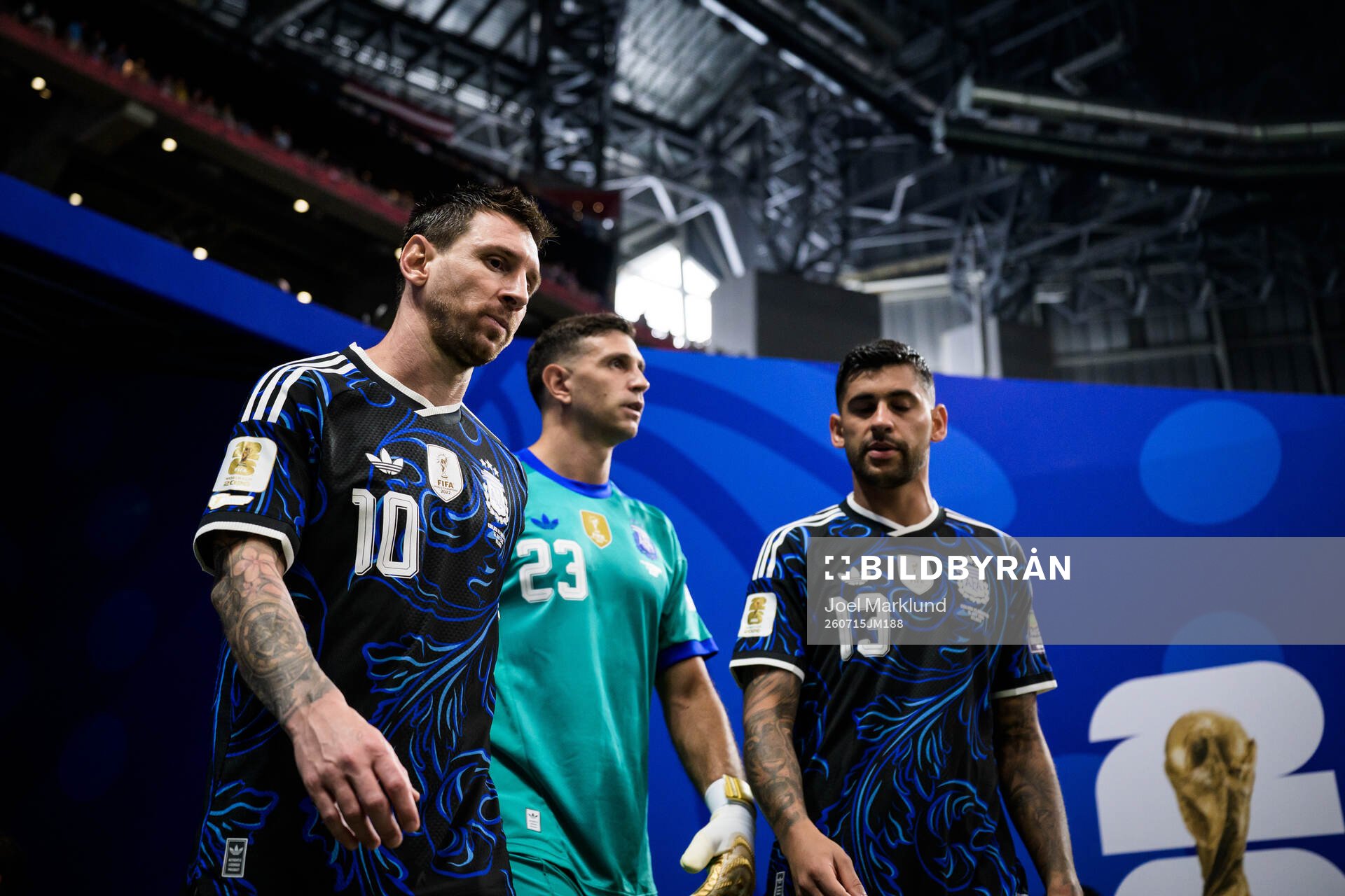 Lionel Messi, goalkeeper Emiliano Martinez and Cristian