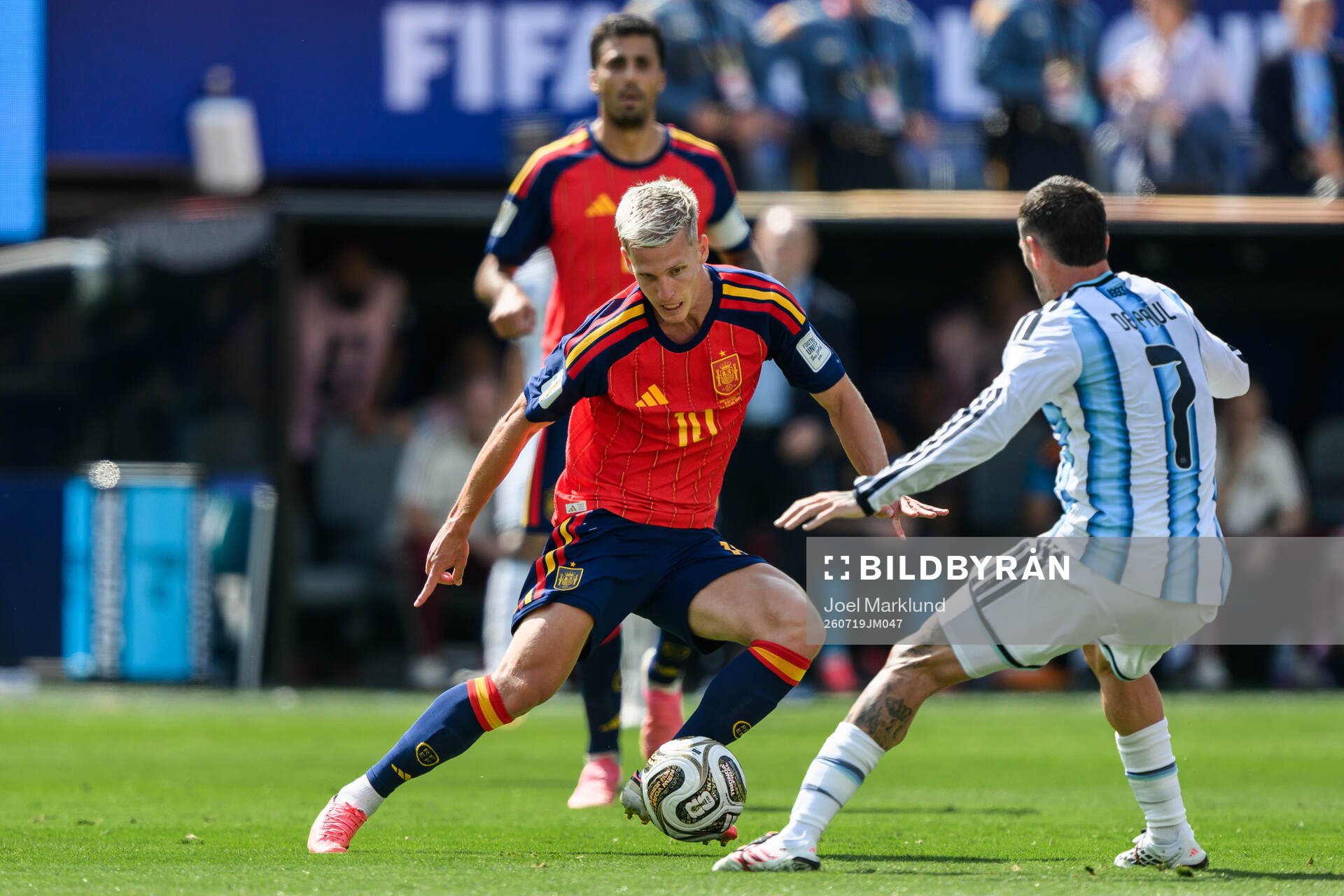 Dani Olmo of Spain and Rodrigo De Paul of Argentina