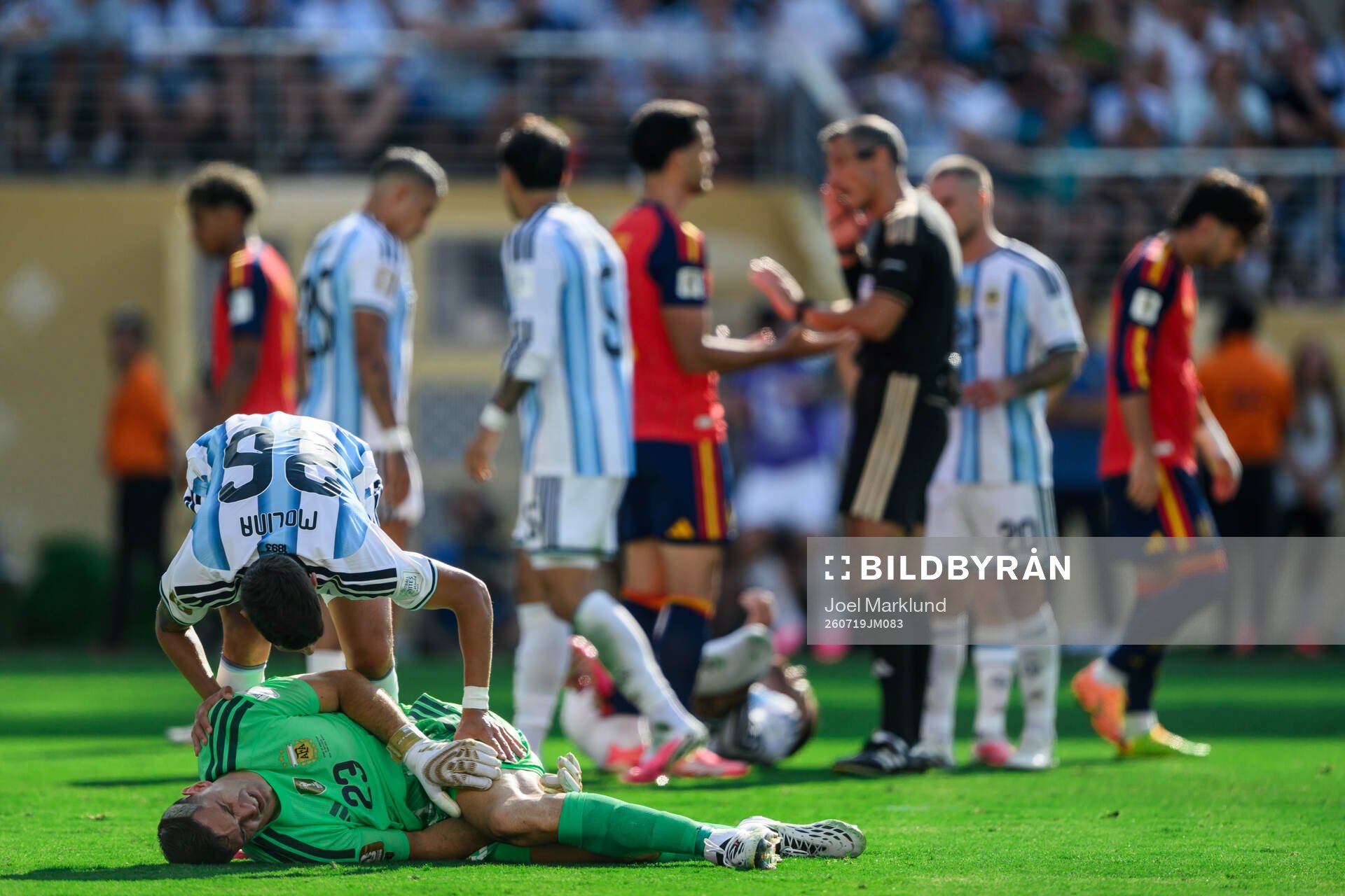 goalkeeper Emiliano Martinez and Nahuel Molina of Argentina