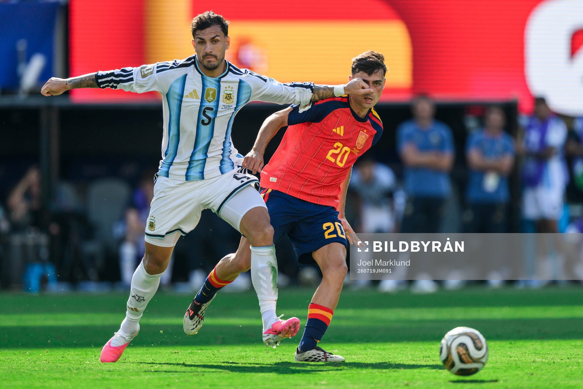 Leandro Paredes of Argentina and Pedri of Spain