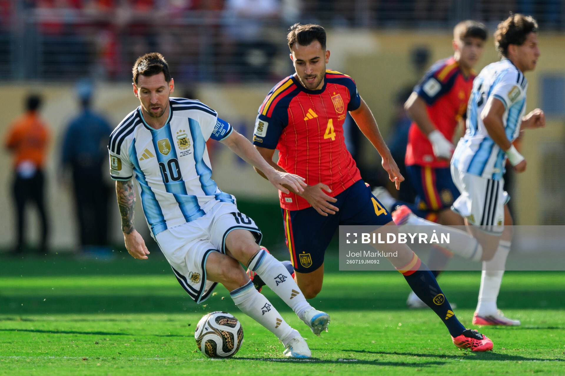 Lionel Messi of Argentina and Eric Garcia of Spain