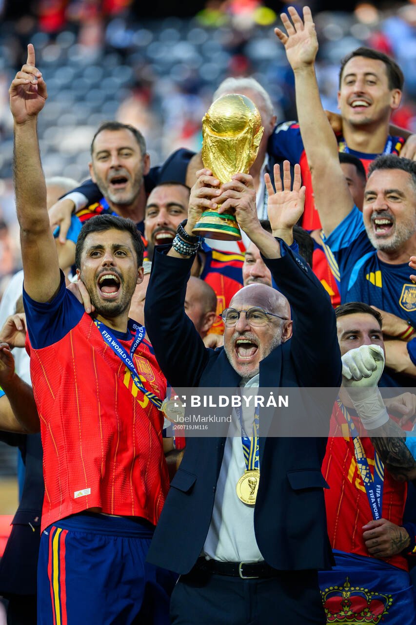 Head coach Luis De La Fuente Castillo of Spain hoists the