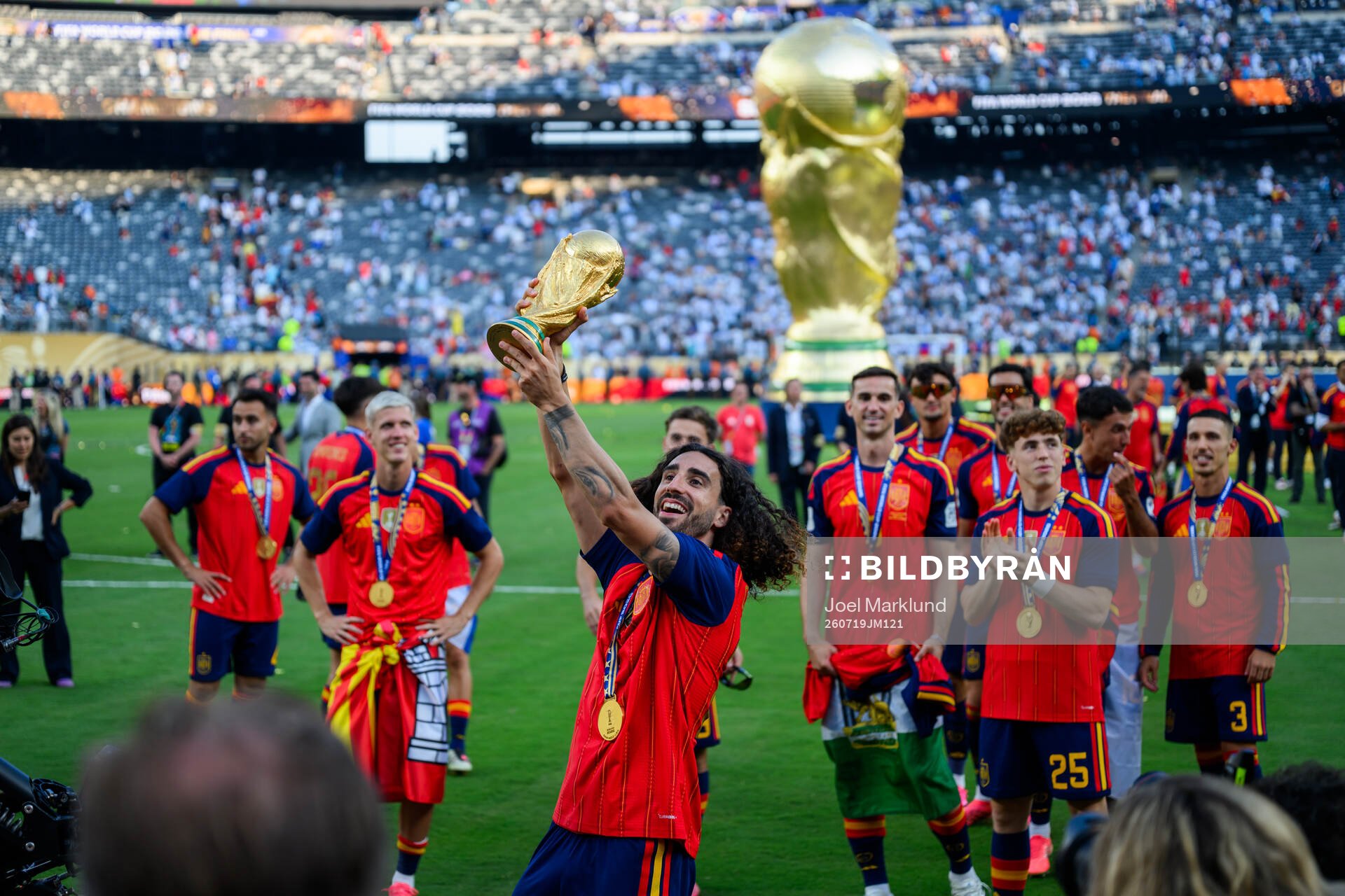 Marc Cucurella of Spain celebrates with the trophy