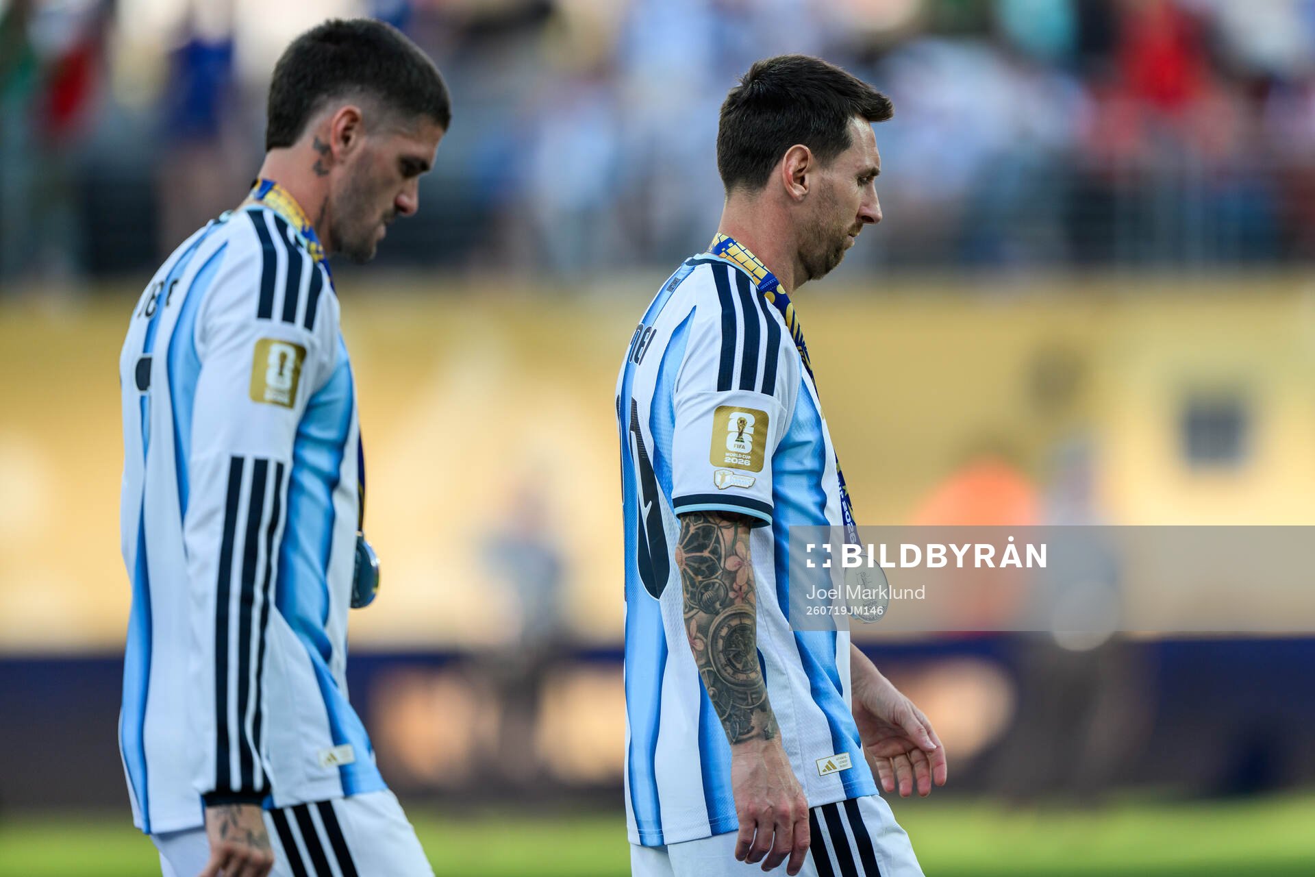 Rodrigo De Paul and Lionel Messi of Argentina look dejected