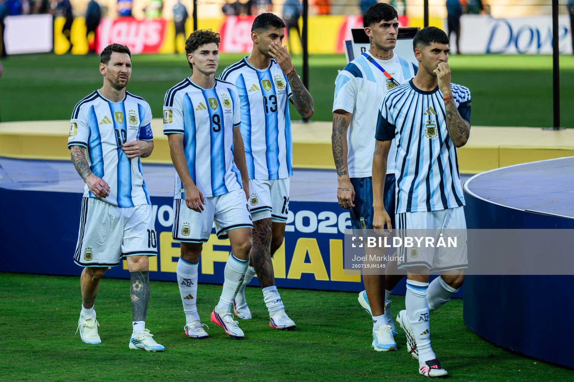 Lionel Messi, Julian Alvarez and Cristian Romero of