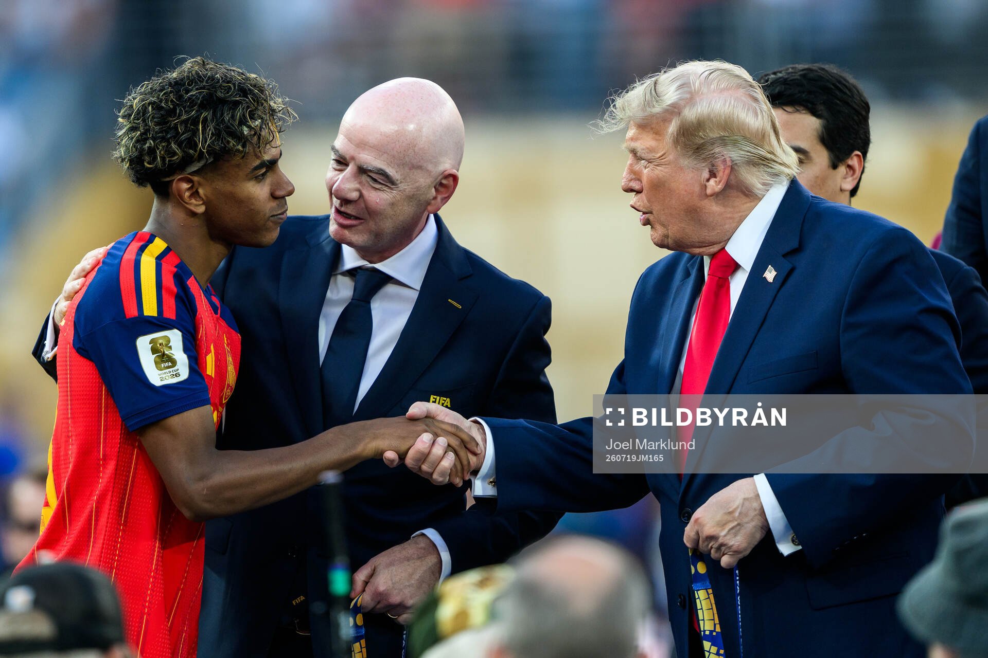 Lamine Yamal of Spain with Gianni Infantino, President of