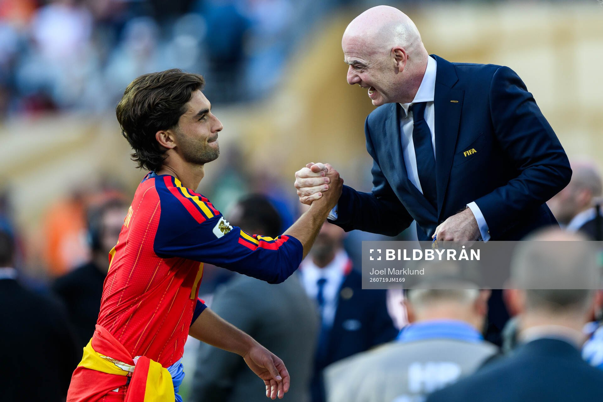 Ferran Torres of Spain and Gianni Infantino, President of