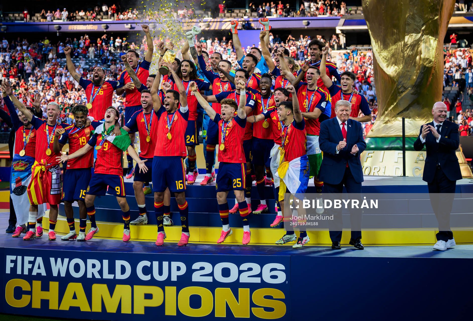 Rodri of Spain hoists the winner’s trophy with US