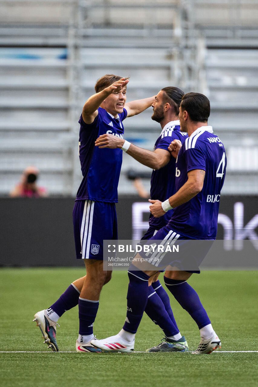 Danylo Sikan of Anderlecht celebrates with teammates