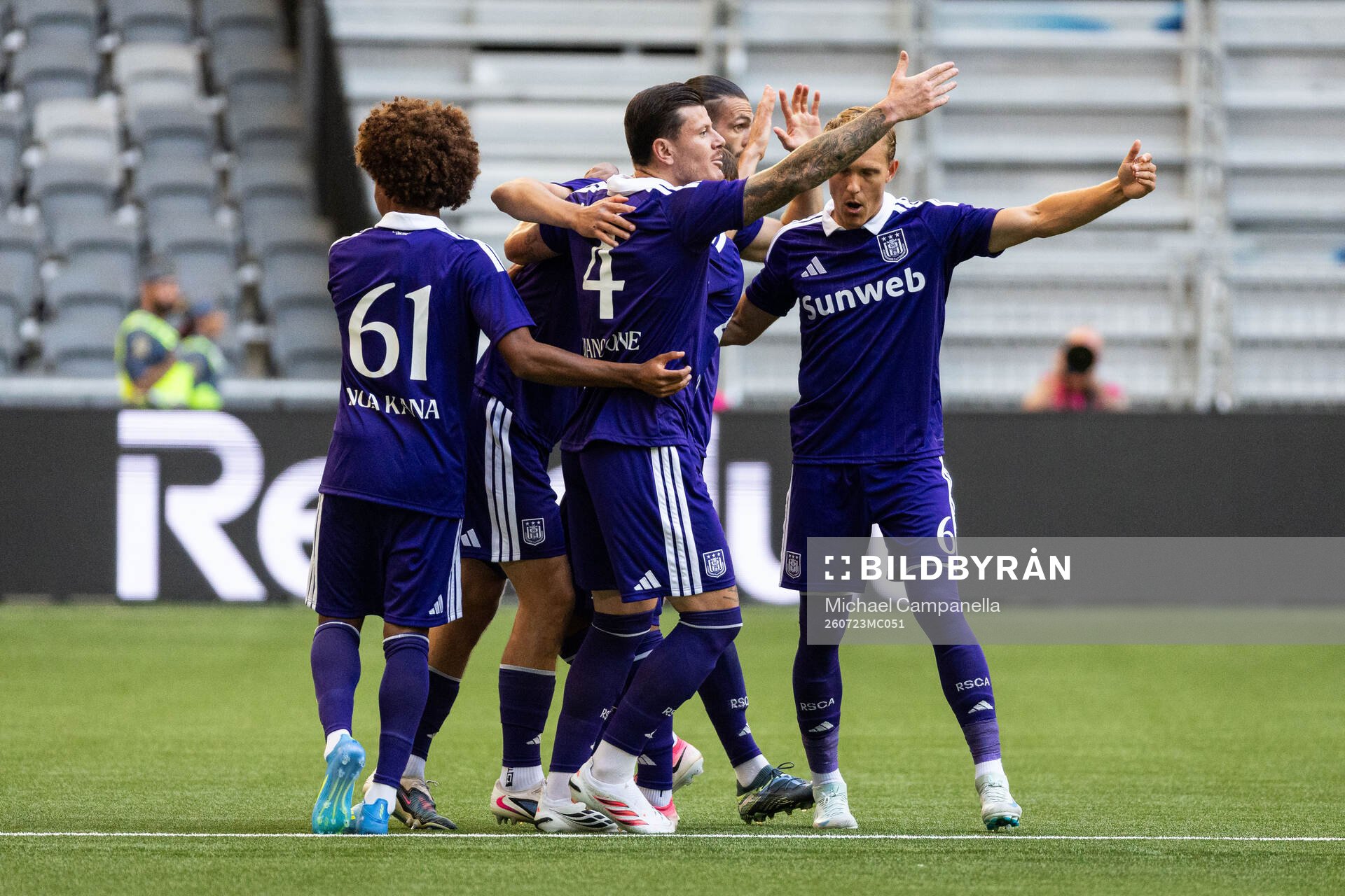 Danylo Sikan of Anderlecht celebrates with teammates