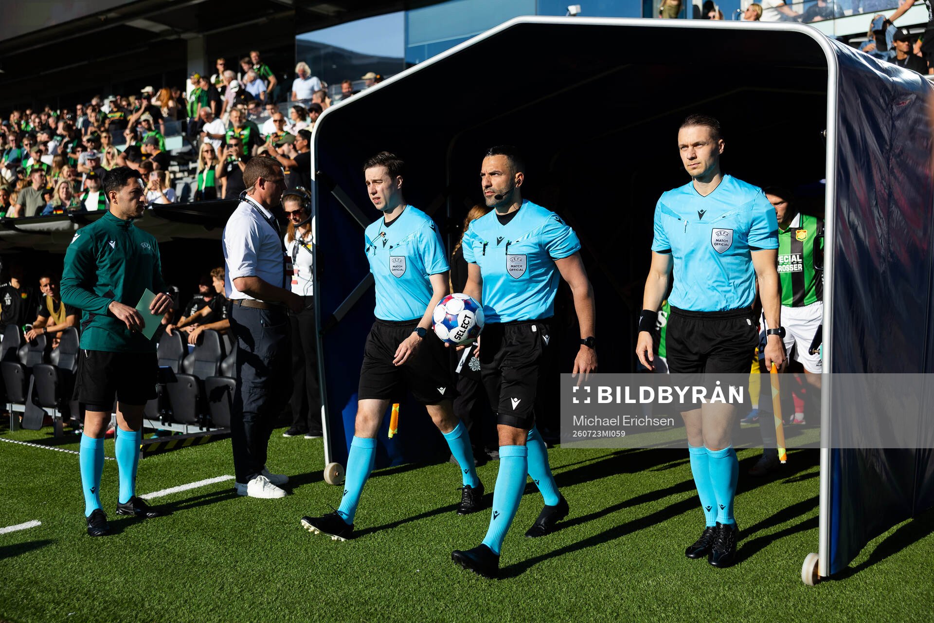Assistant referee Christian De Casseres, referee Peiman
