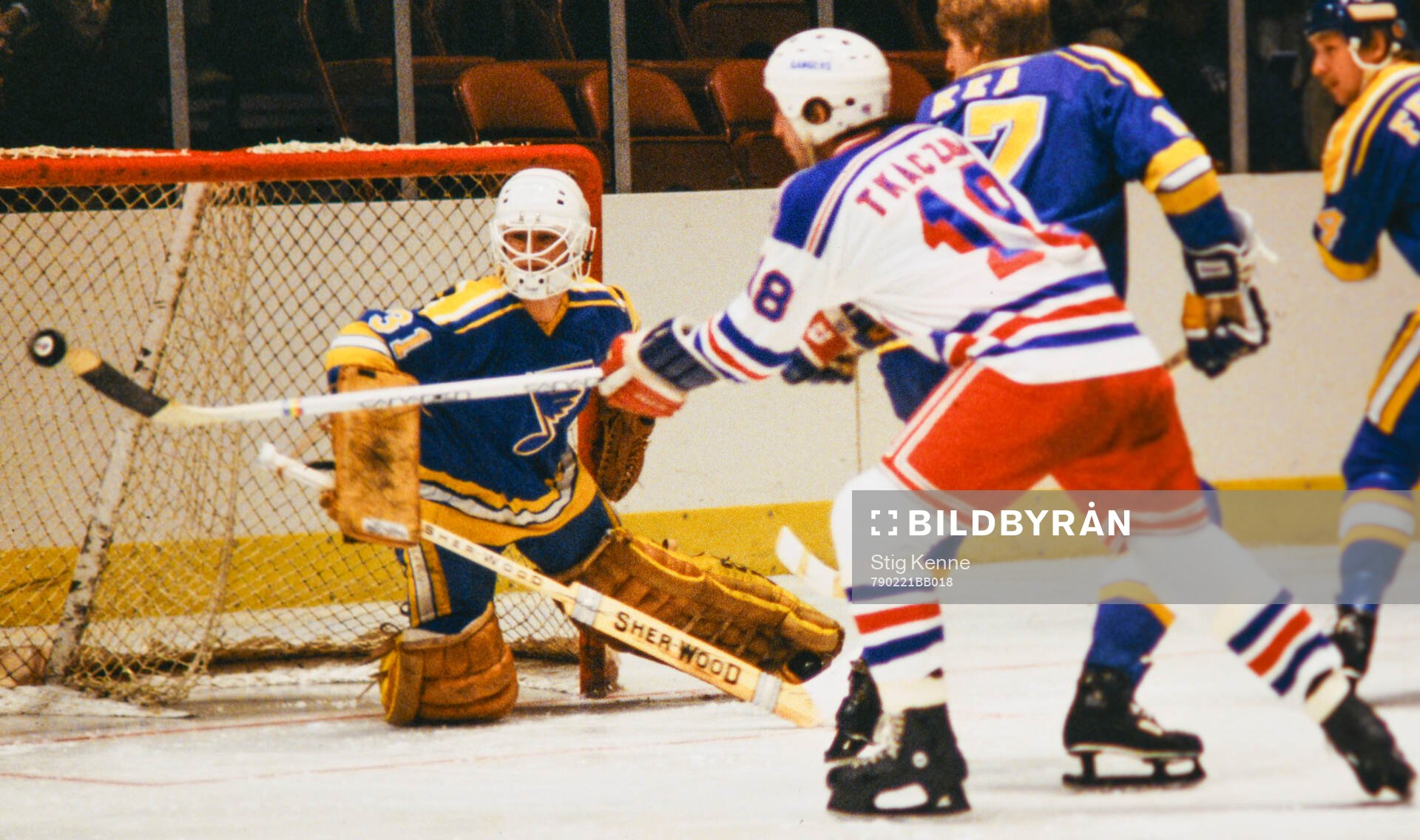 Walt Tkaczuk of New York Rangers shoots against goalkeeper