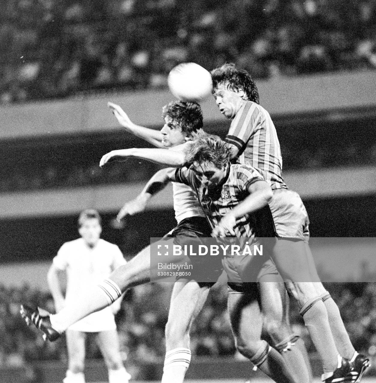 Mark Falco of Tottenham in an air duel