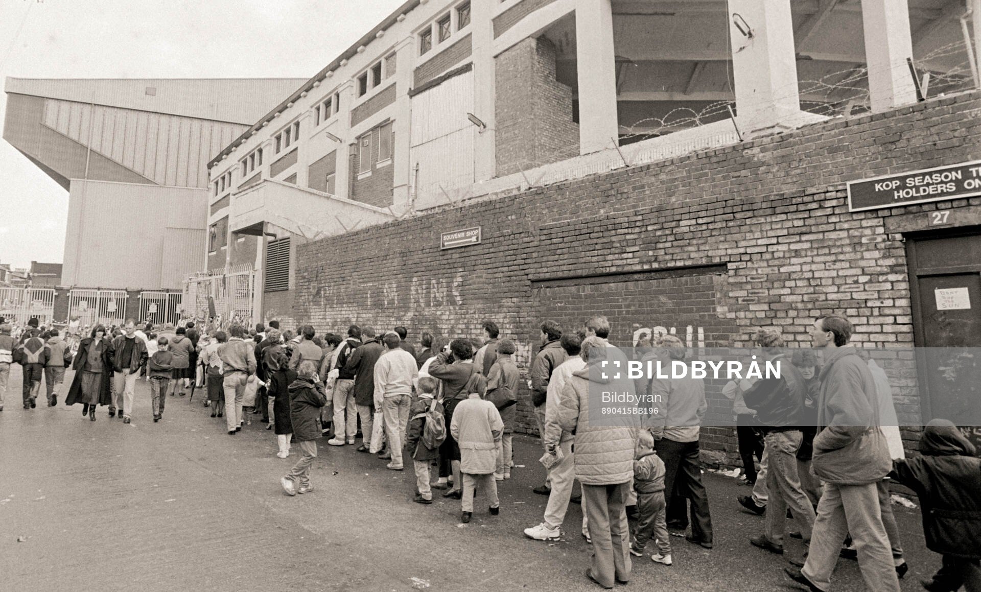 People que outside Anfield to pay tribute to the 96 victims