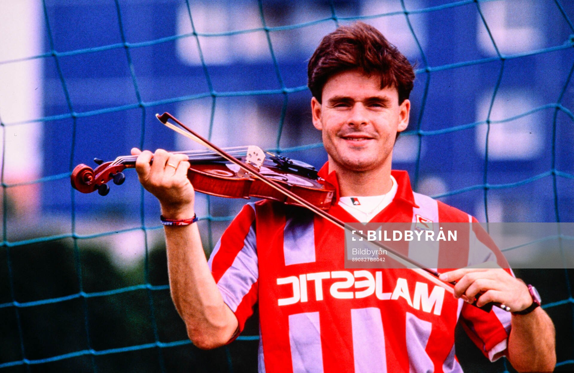 Anders Limpar of Cremonese with a violin