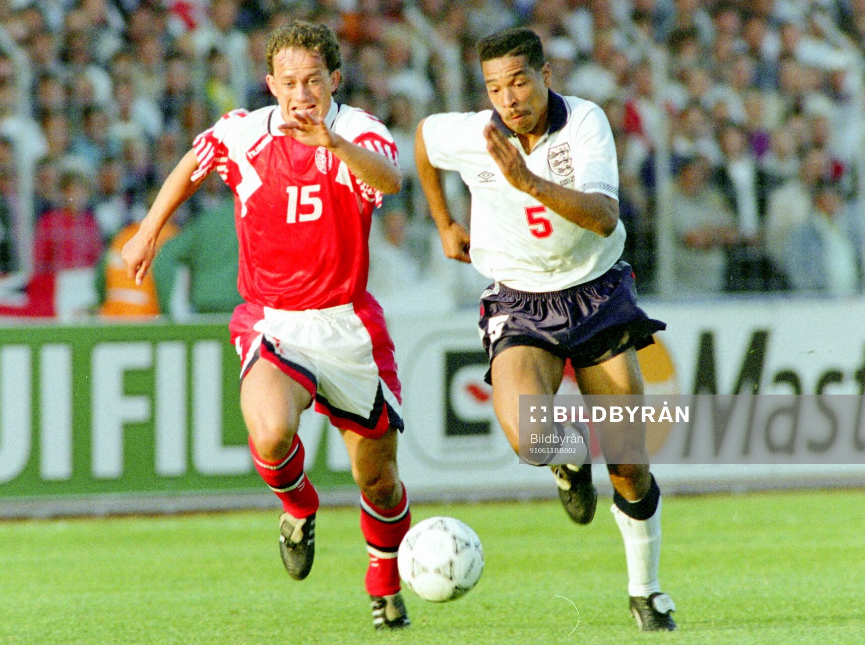 Englands Des Walker (R) against Denmarks Bent Christensen
