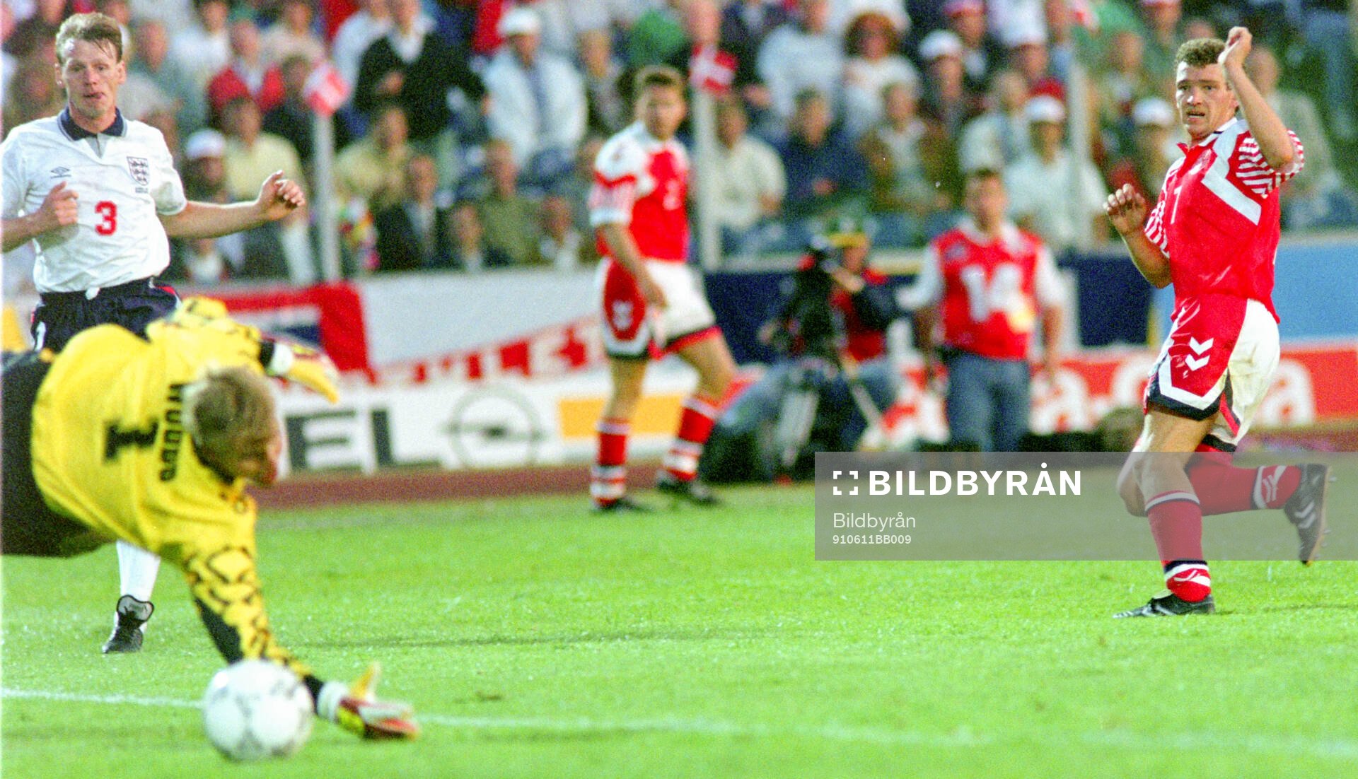 Englands goalkeeper Chris Woods watches a shot by Denmarks