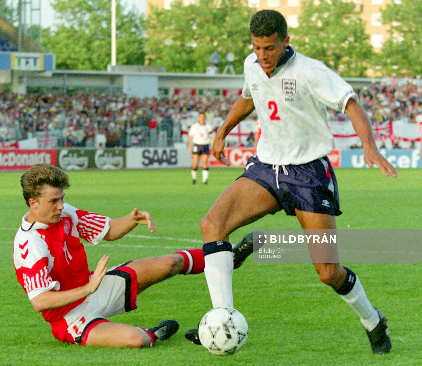 Englands Keith Curle (R) against Denmarks Brian Laudrup